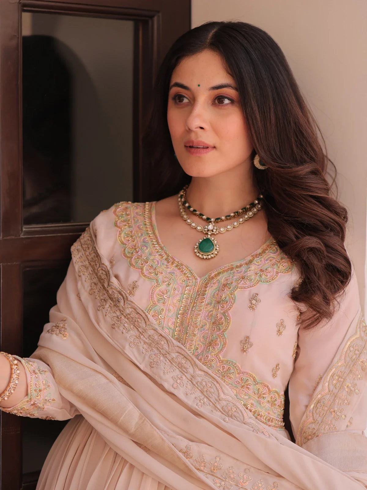 Tarani beige star georgette gown upper body view highlighting neckline and embroidery