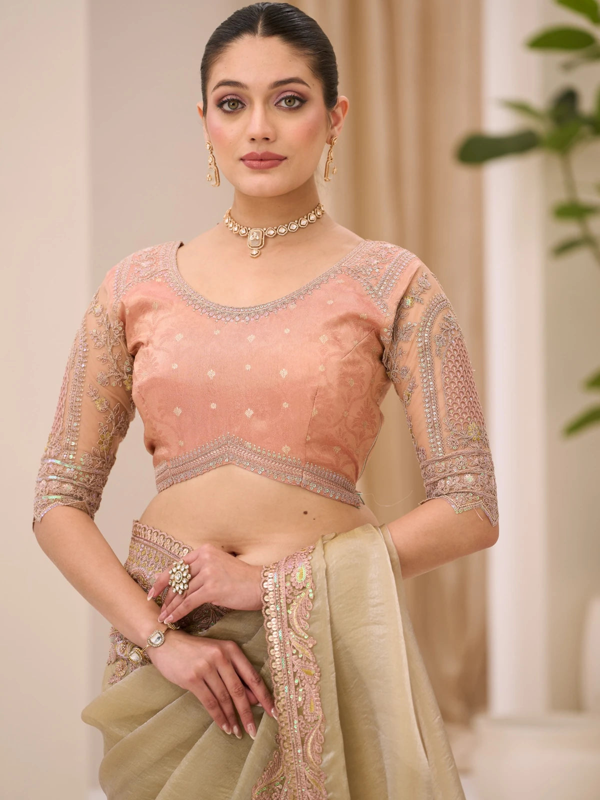 Tarani Kumudini blouse view of sage green Sunsilk tissue saree with peach brocade zari work blouse