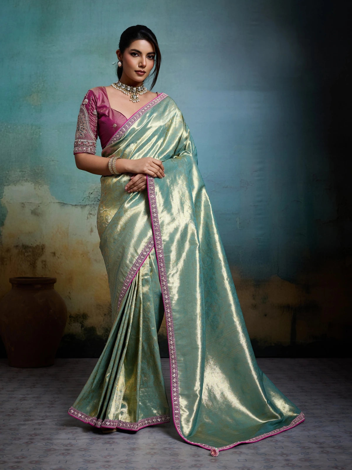 Tarani green tissue Banarasi saree with pink blouse full view party wear look