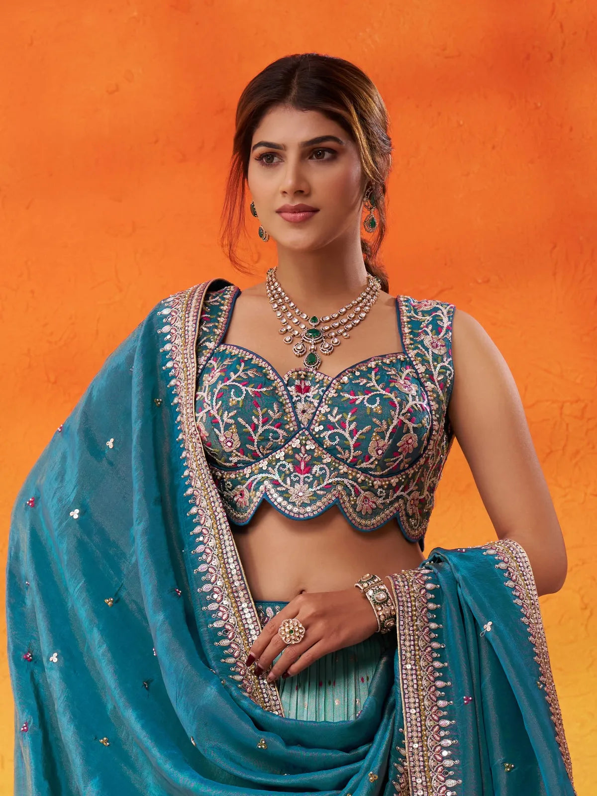 Tarani green blouse embroidery and neckline design of lehenga with ethnic touch