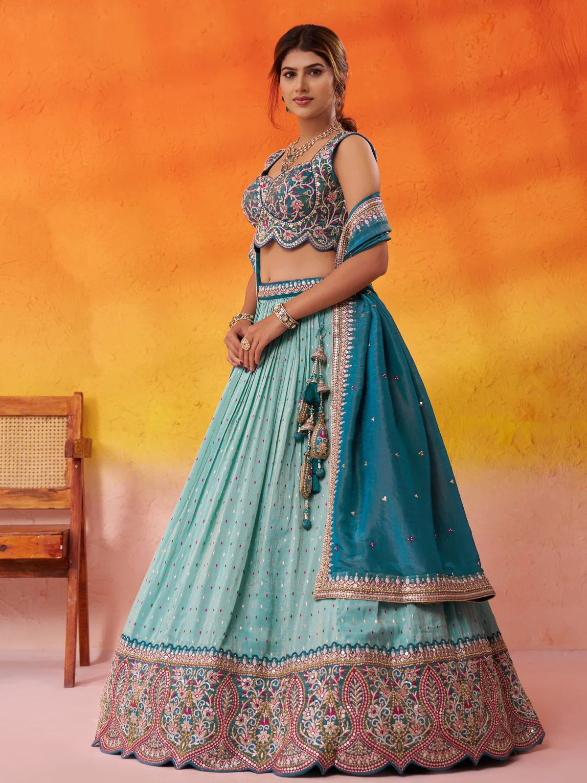 Tarani side pose green lehenga with moti and sequin embroidery work and dupatta styling