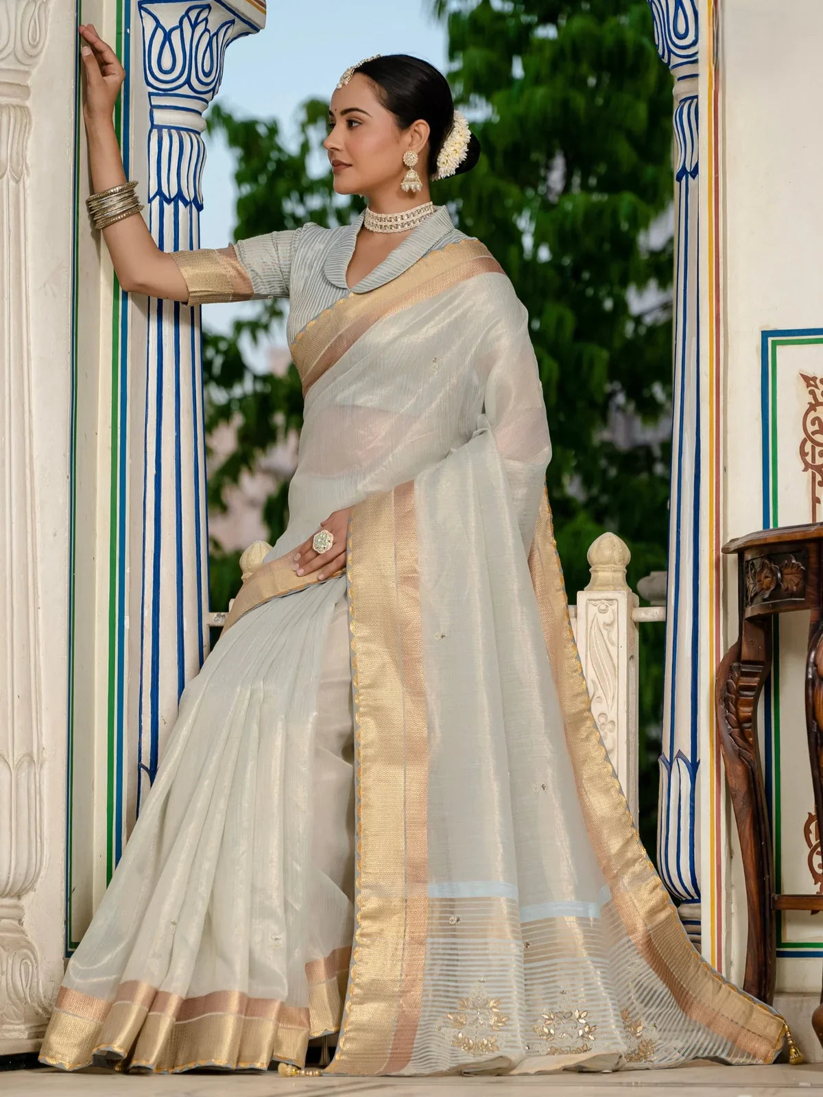 Tarani off white tissue linen saree with golden zari border full view