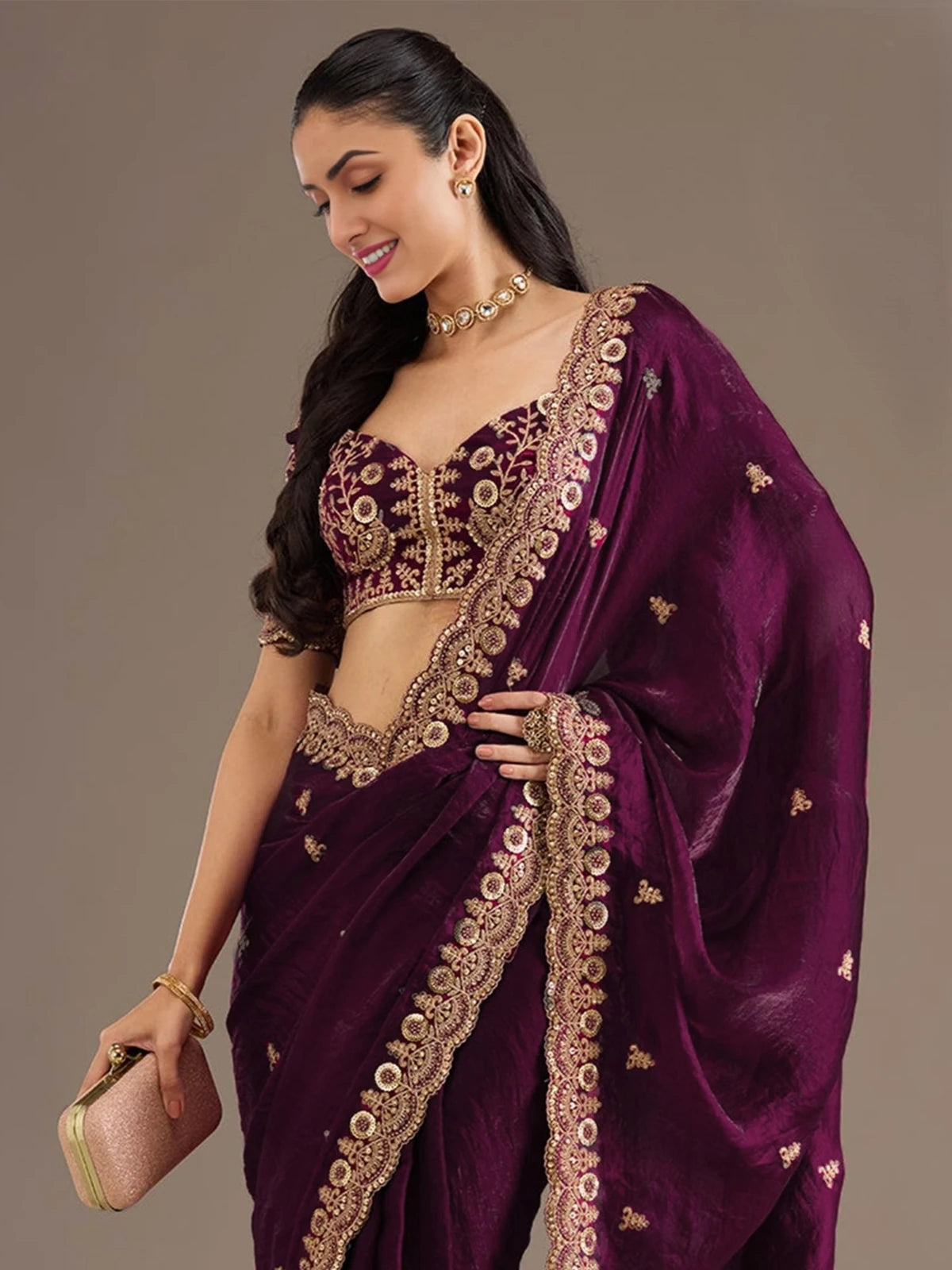 Tarani Avika wine tissue saree pallu view highlighting rich zari dori sequins embroidered border