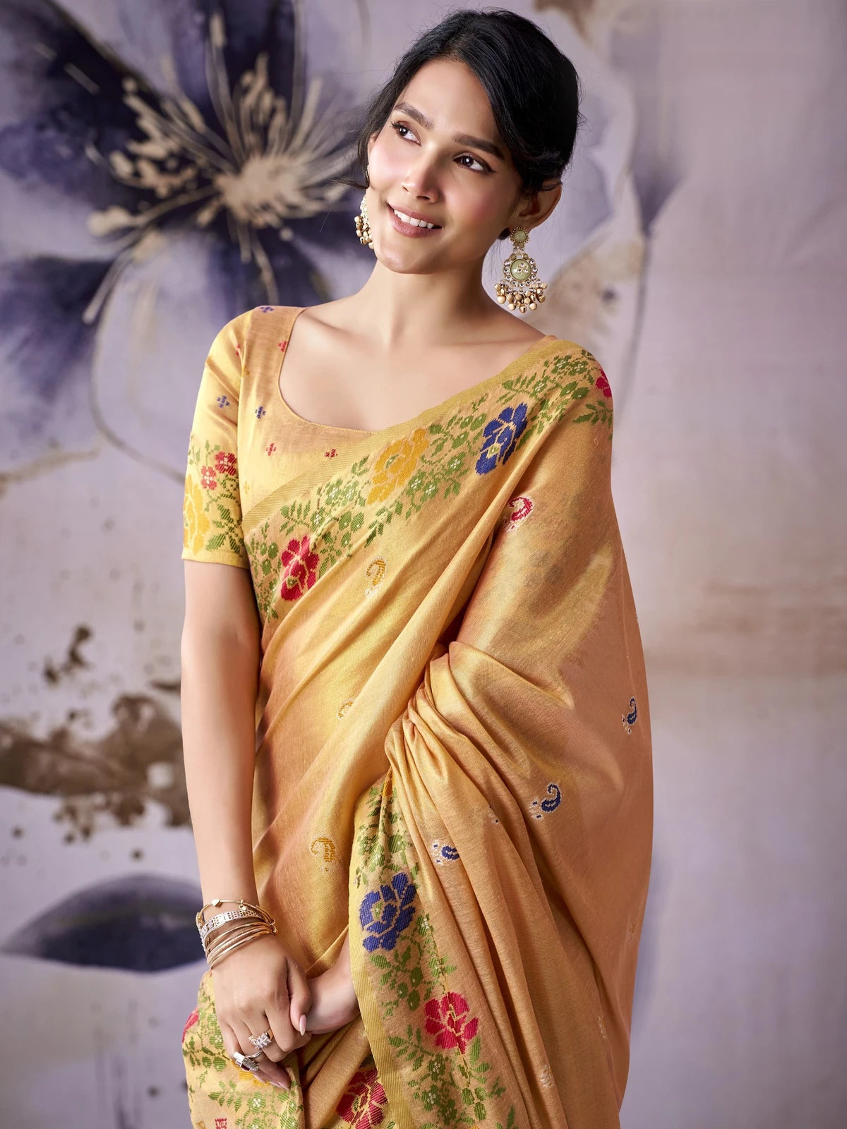 Tarani golden tissue silk saree floral woven design closeup-view