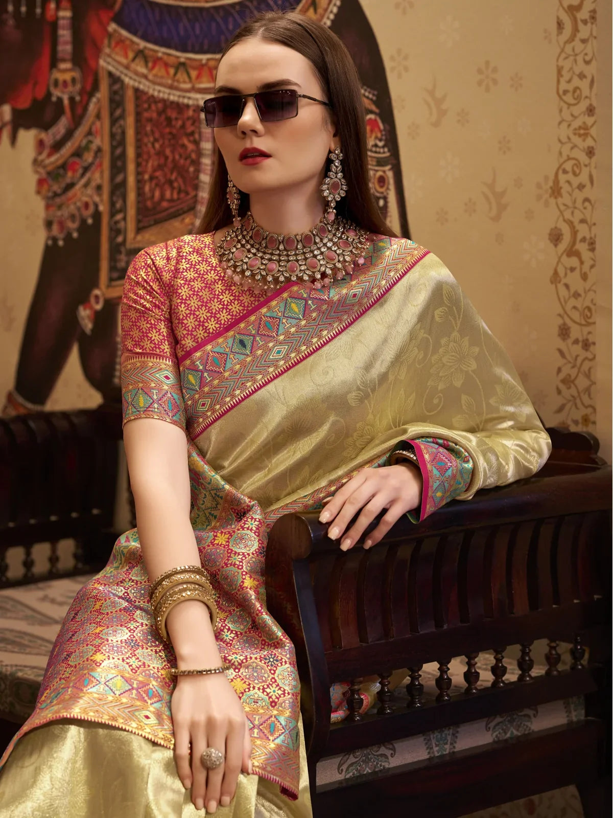 Tarani golden tissue silk saree closeup view showing woven detailing and fabric texture