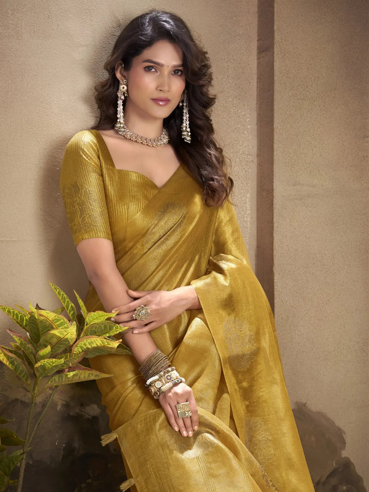 Tarani golden tissue silk saree closeup view showing fabric detailing