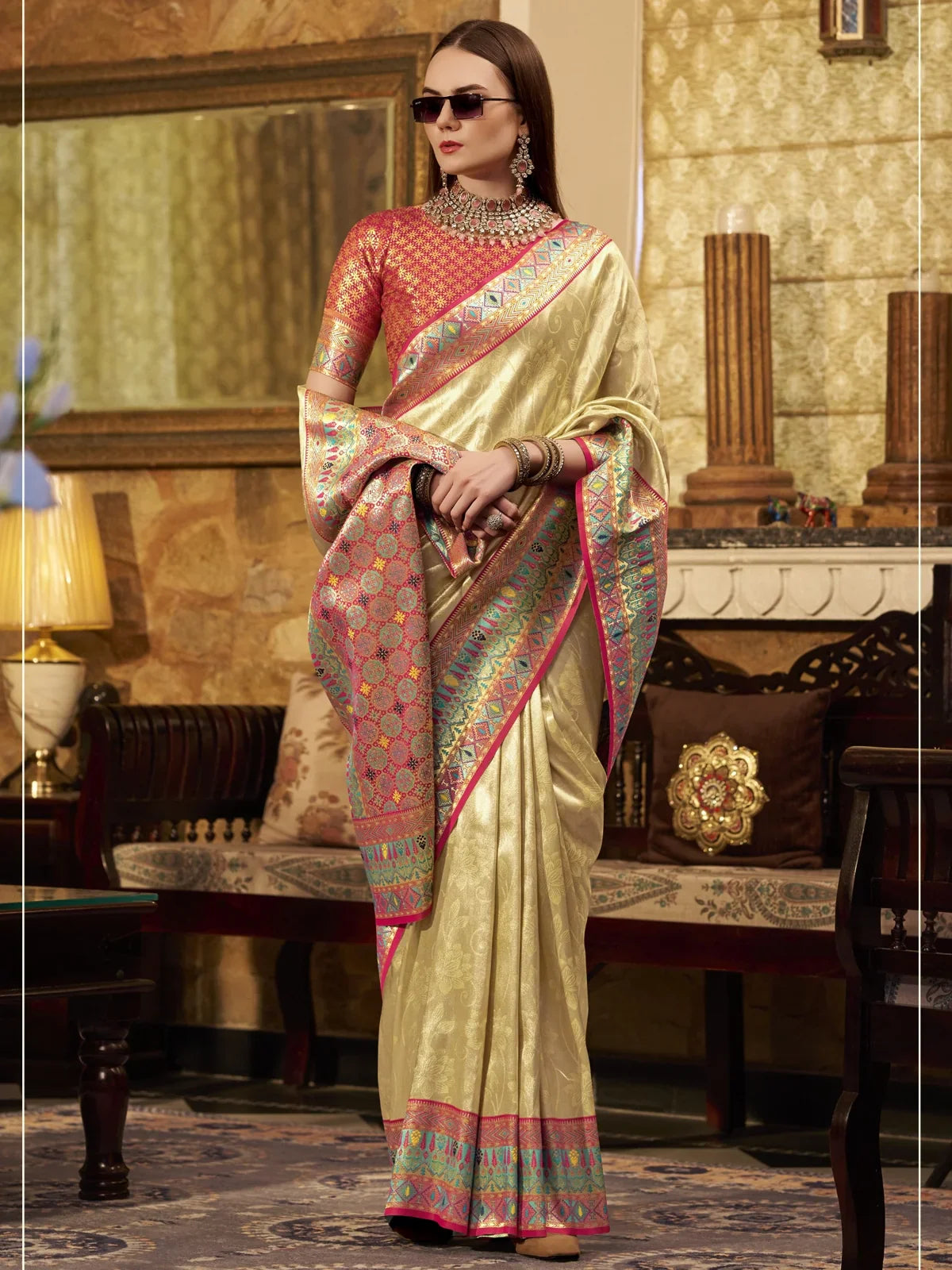 Tarani golden tissue silk saree front pose with intricate woven pallu and blouse