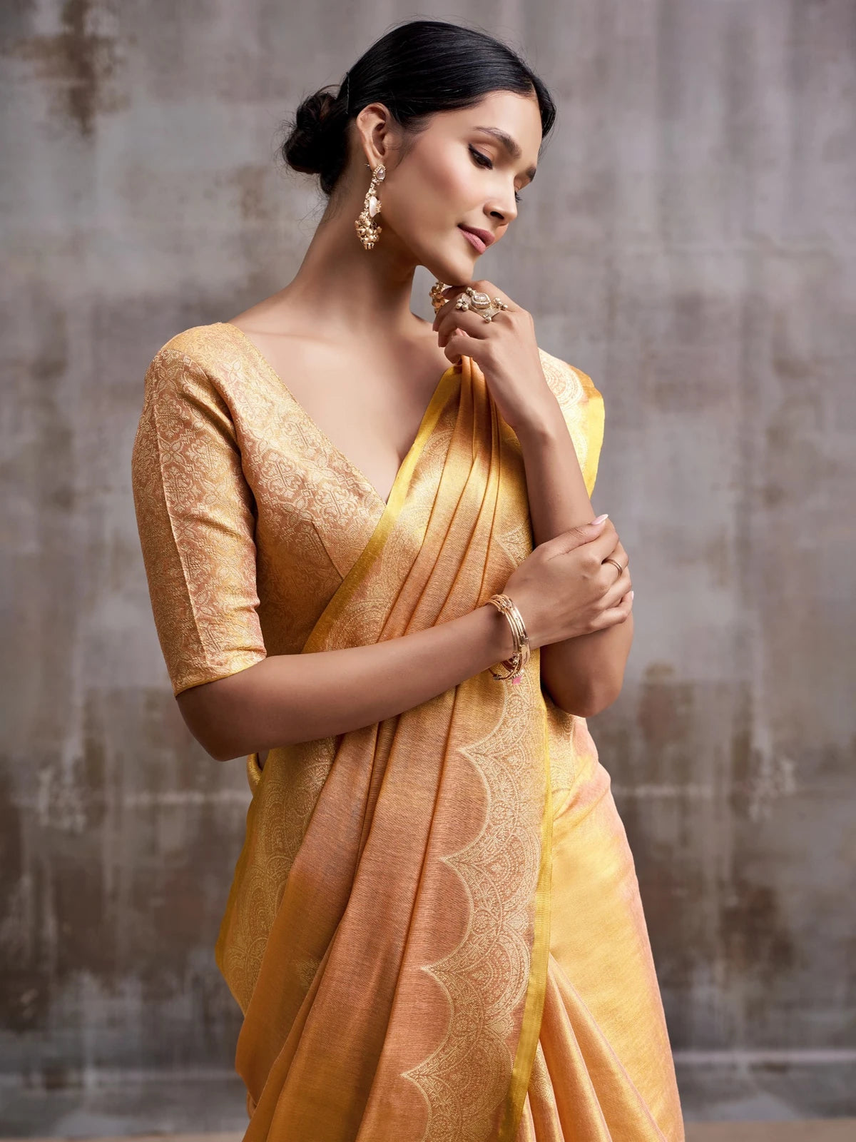 Tarani golden tissue silk saree upper body view showing elegant woven blouse