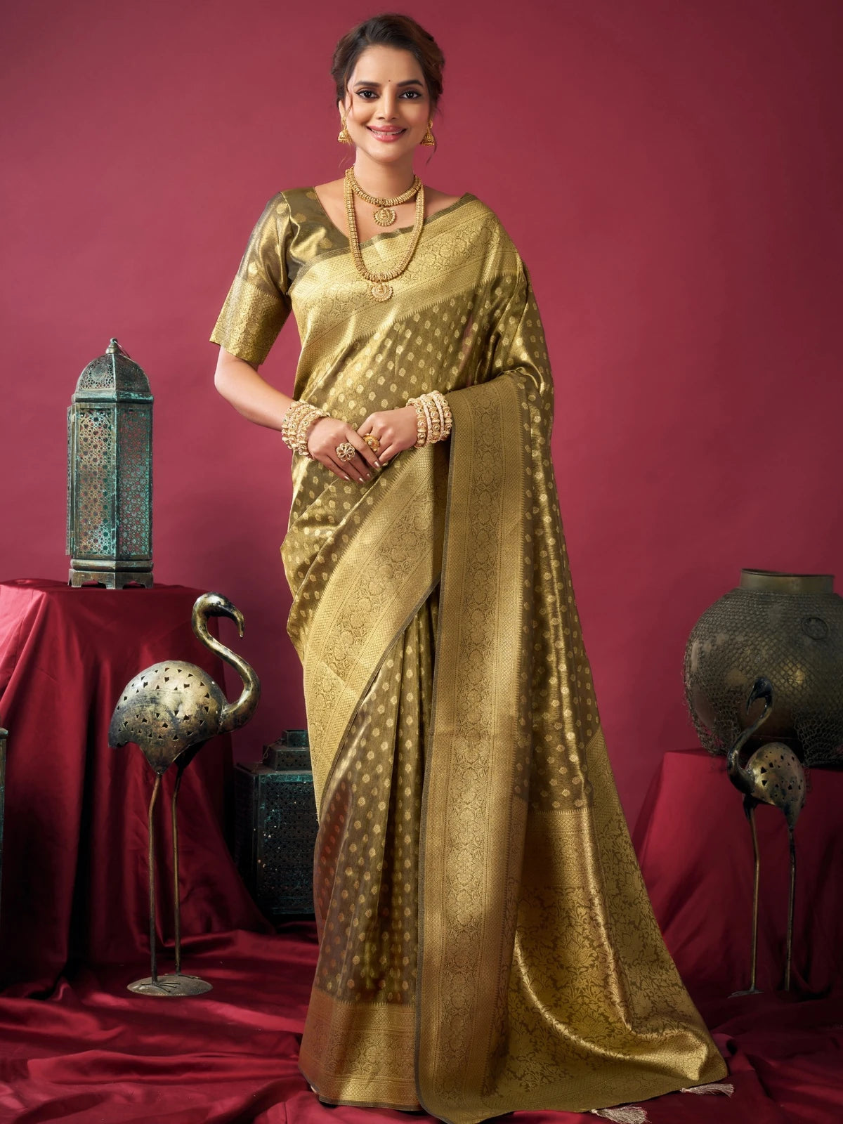 Tarani Snehal green Tissue Silk saree with Zhallar full view featuring rich zari woven border and festive elegance