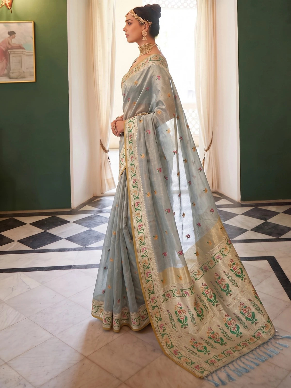 Tarani Lipika grey tissue silk saree side view with floral weaving and statement pallu
