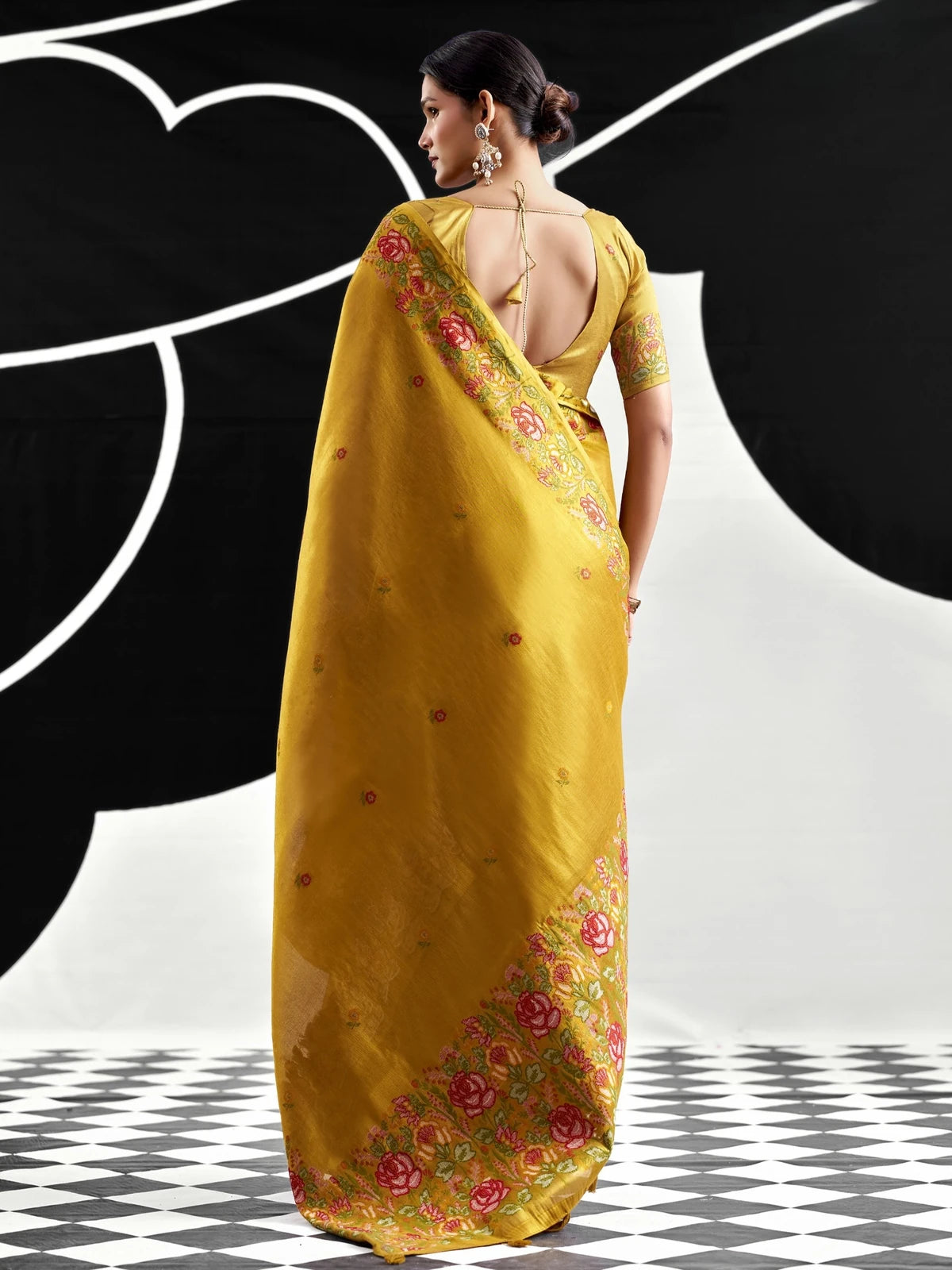Tarani mustard tissue silk saree with floral woven border back-view Priyansha