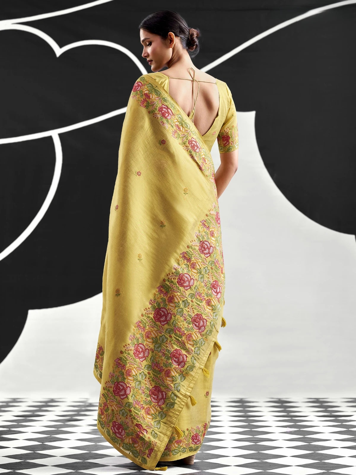 Tarani mustard tissue silk saree back view highlighting pallu and blouse back