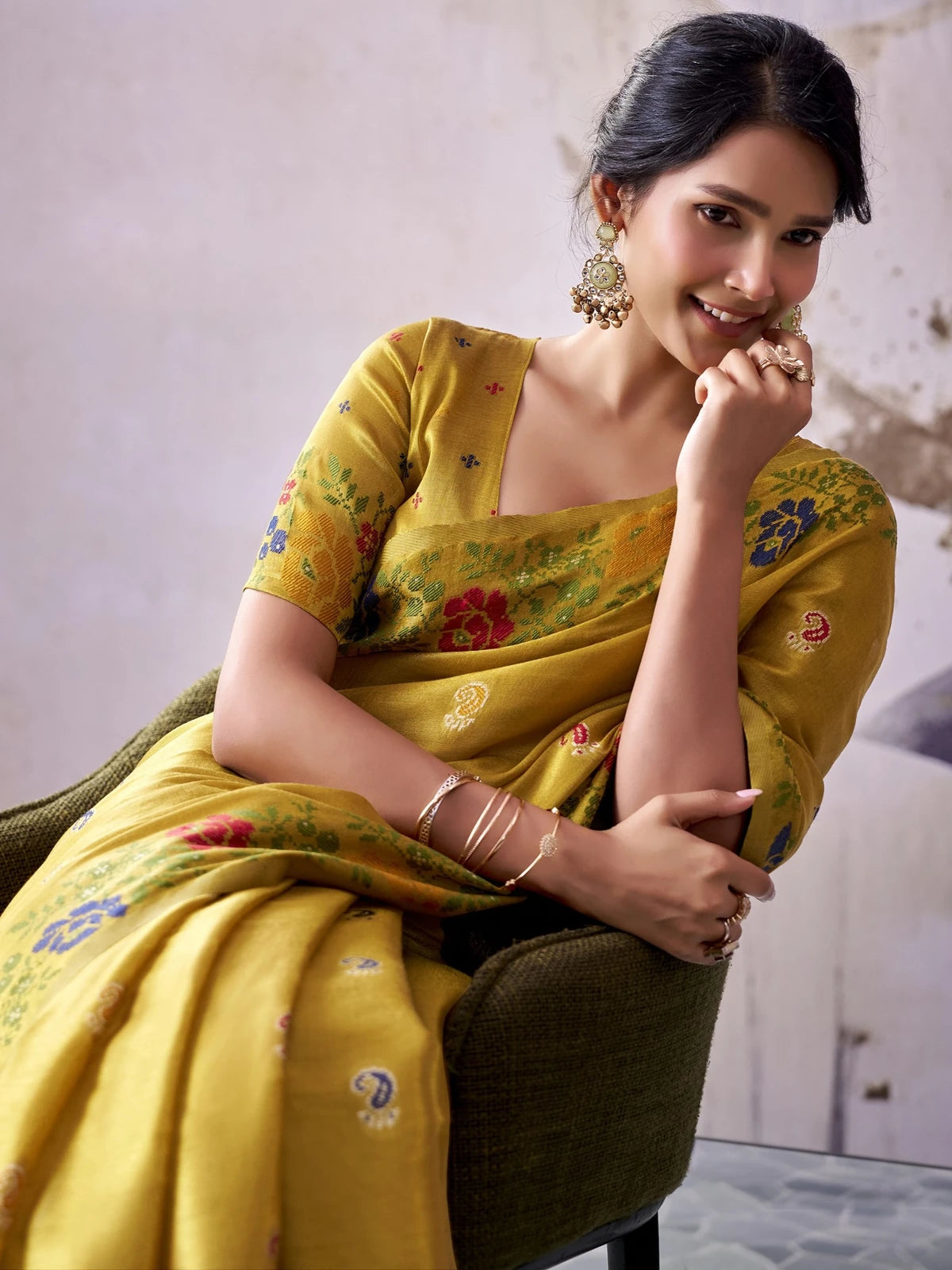 Tarani mustard tissue silk saree closeup showing weave and motifs
