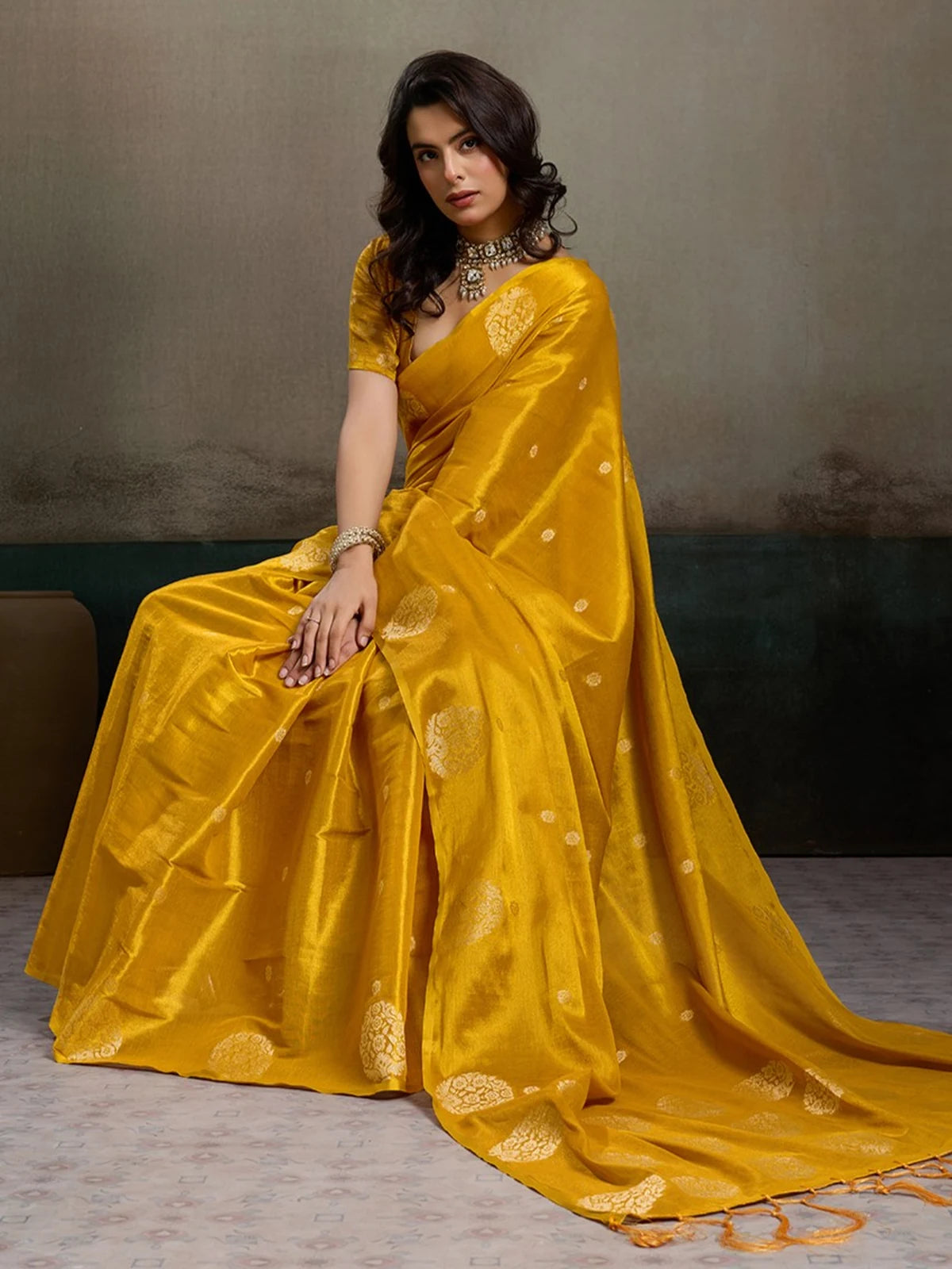 Tarani mustard tissue silk saree Shefali front view with woven motifs and blouse