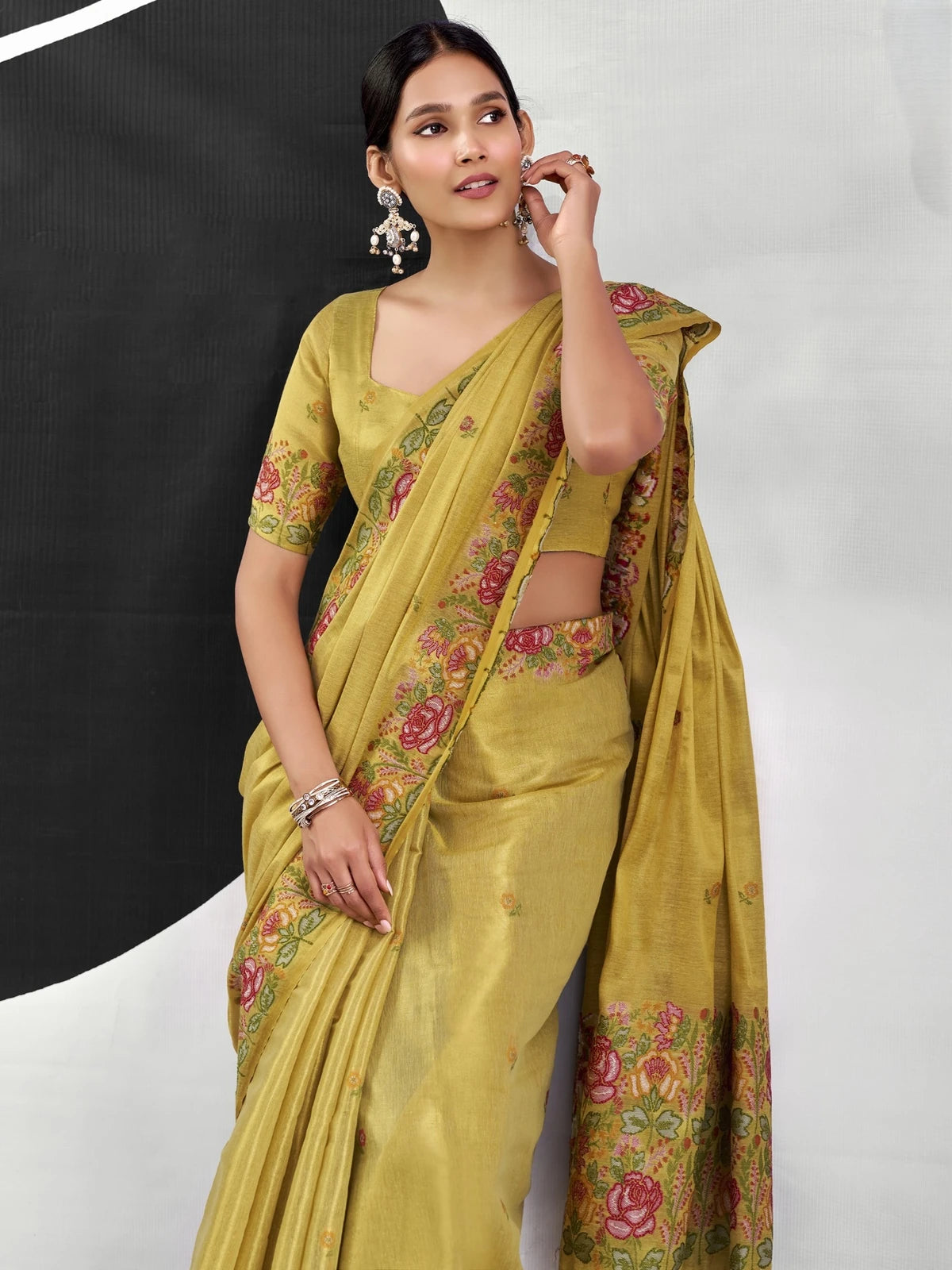 Tarani mustard tissue silk saree upper body view showing floral border and blouse design