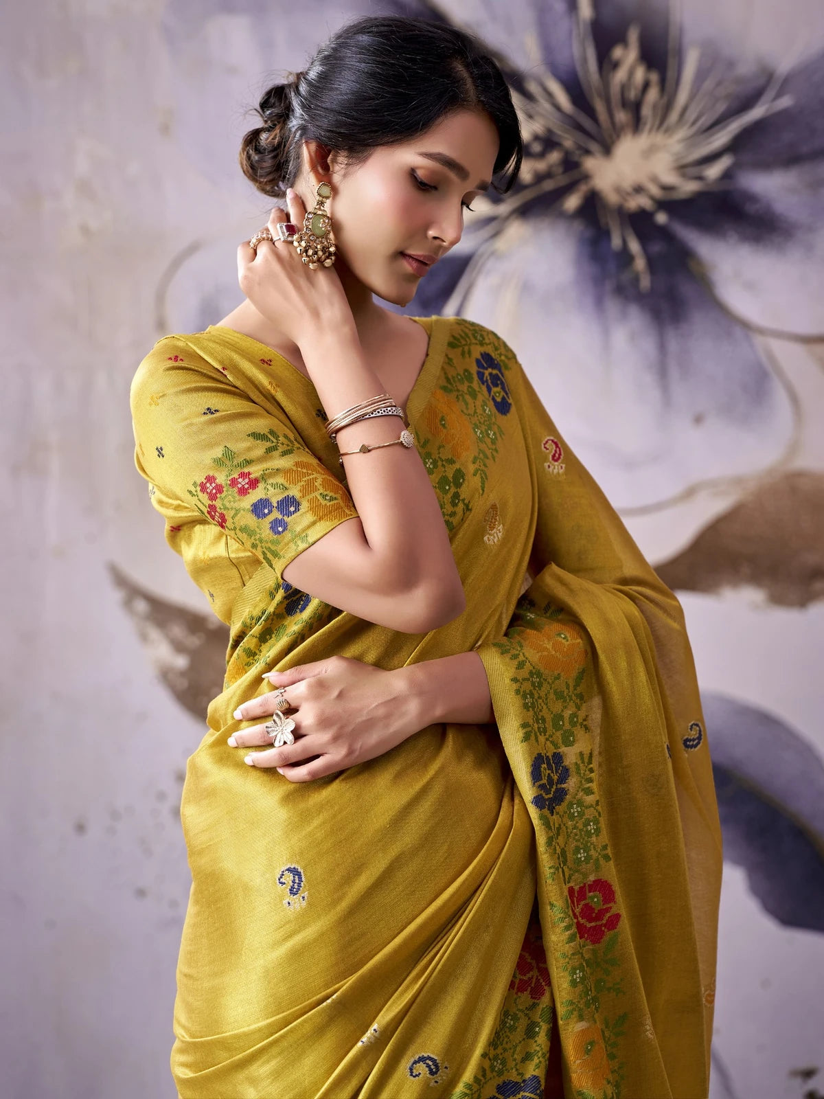 Tarani mustard tissue silk saree upper body view showing woven blouse