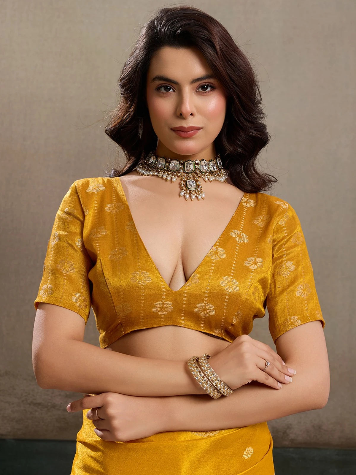 Tarani mustard tissue silk saree Shefali upper body view with woven motifs and blouse
