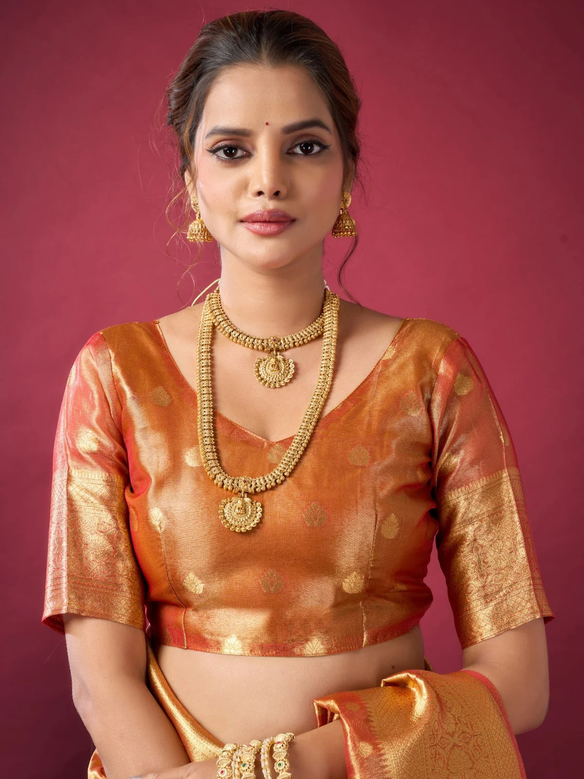 Tarani orange tissue silk saree upper body view with woven blouse and zari detailing for Ameya