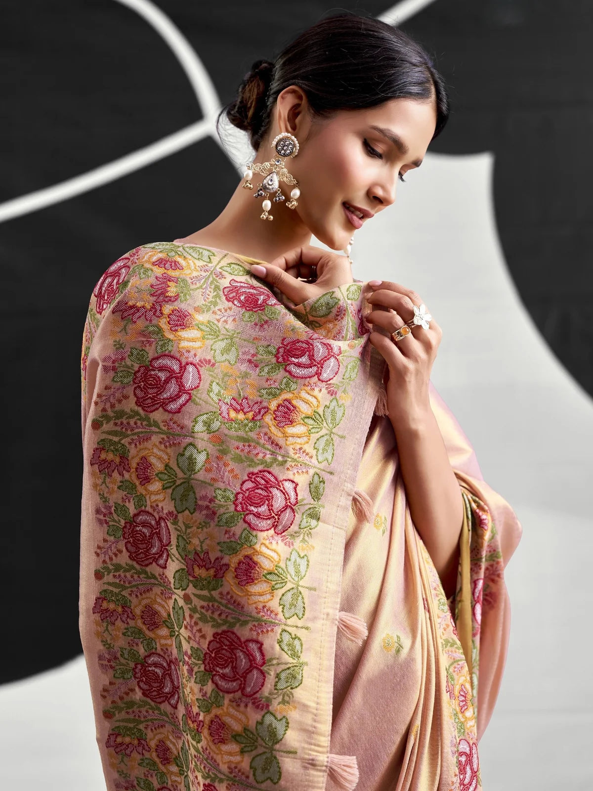 Tarani peach Tissue Silk saree floral border closeup