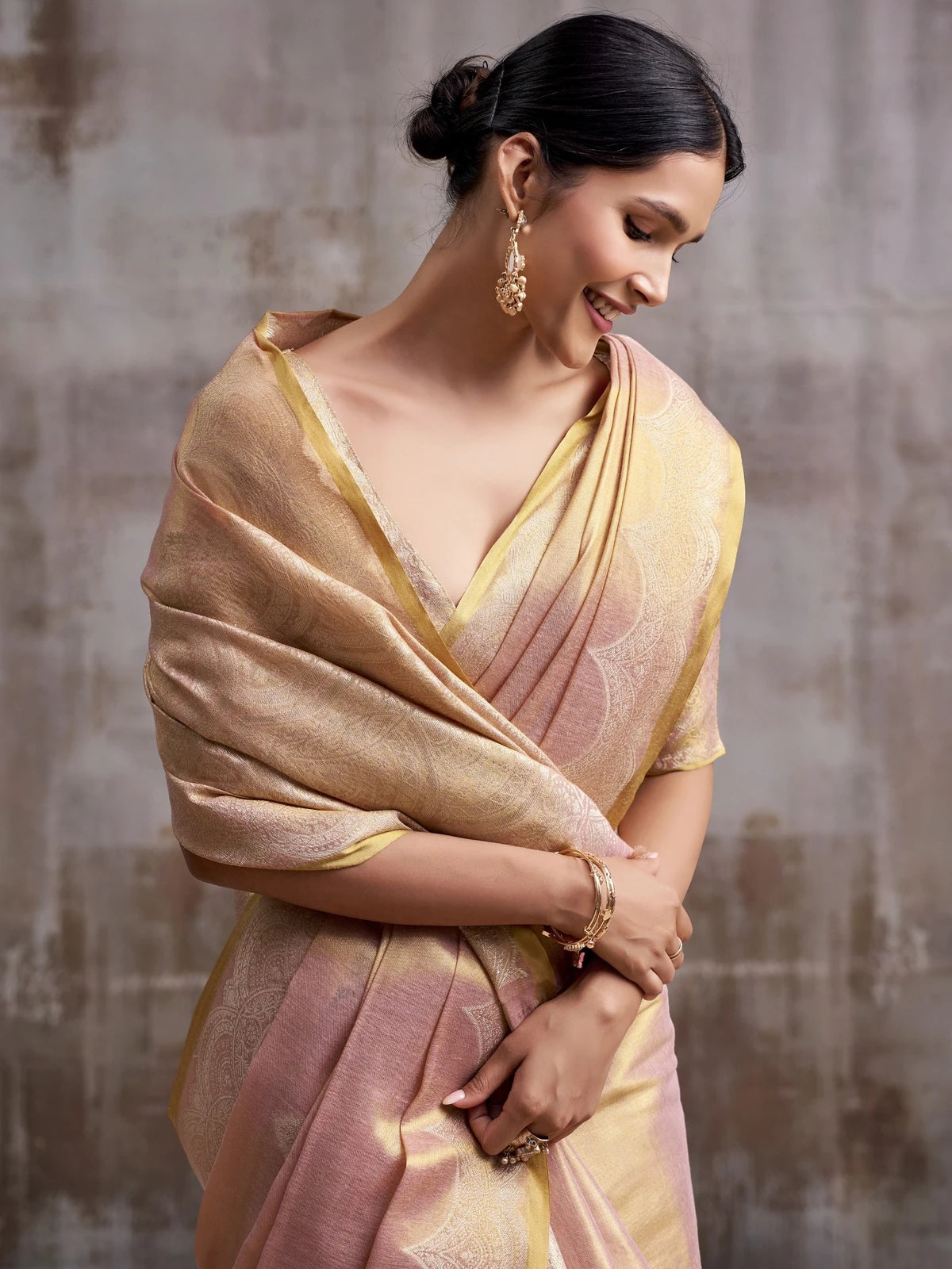 Tarani peach tissue silk saree closeup-view with woven border and unstitched blouse Sanskruti