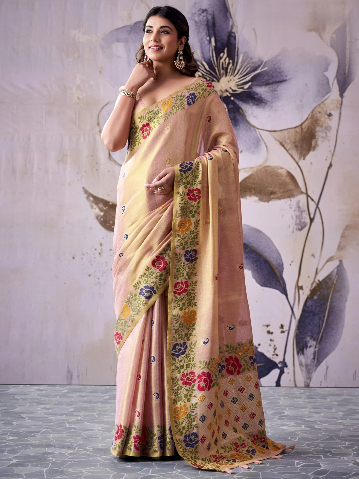 Tarani peach Tissue Silk saree full view with floral woven border and rich pallu