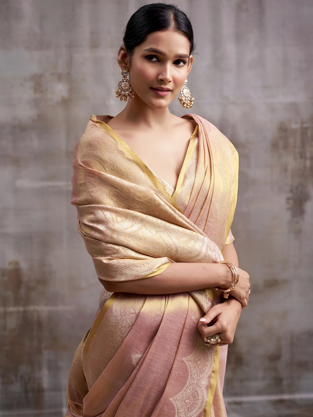 Tarani peach tissue silk saree upper-body-view with woven border and unstitched blouse Sanskruti