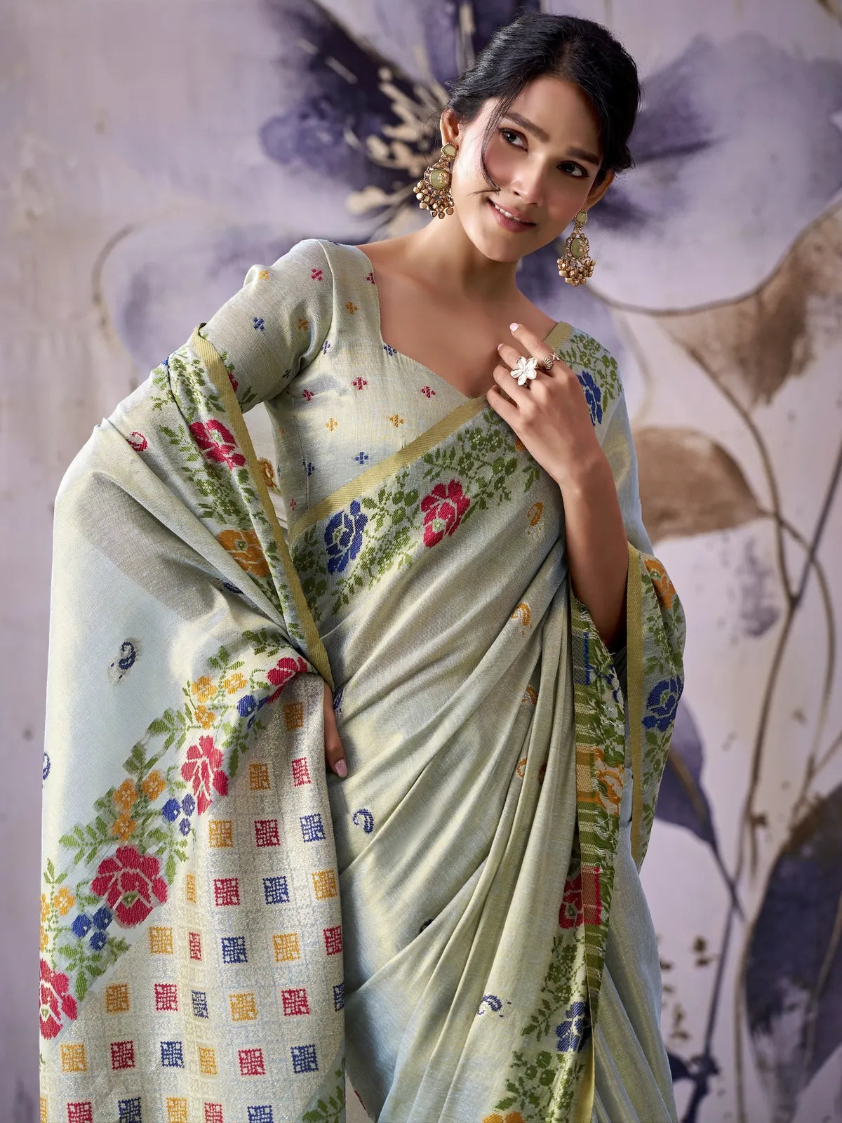 Tarani tissue silk saree in soft sage green floral woven upper body view