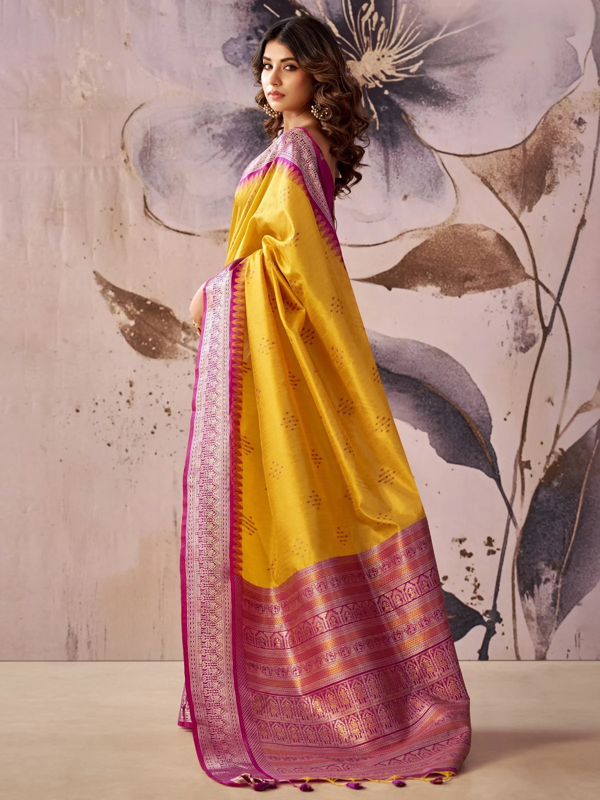 Tarani yellow Tissue Silk saree side view highlighting Jacquard pallu and woven border