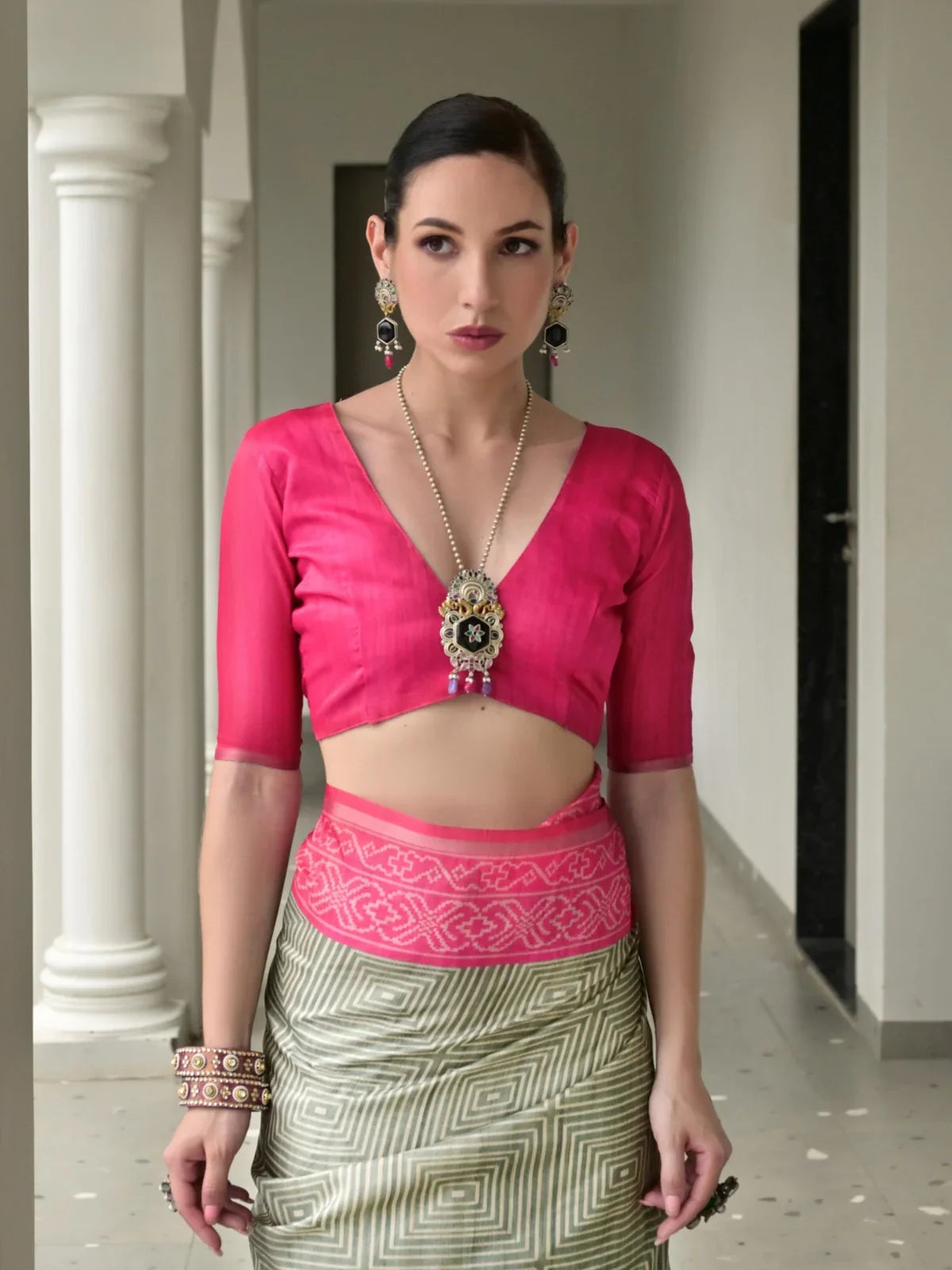 Tarani tussar silk saree close upper body view showing pink blouse and necklace