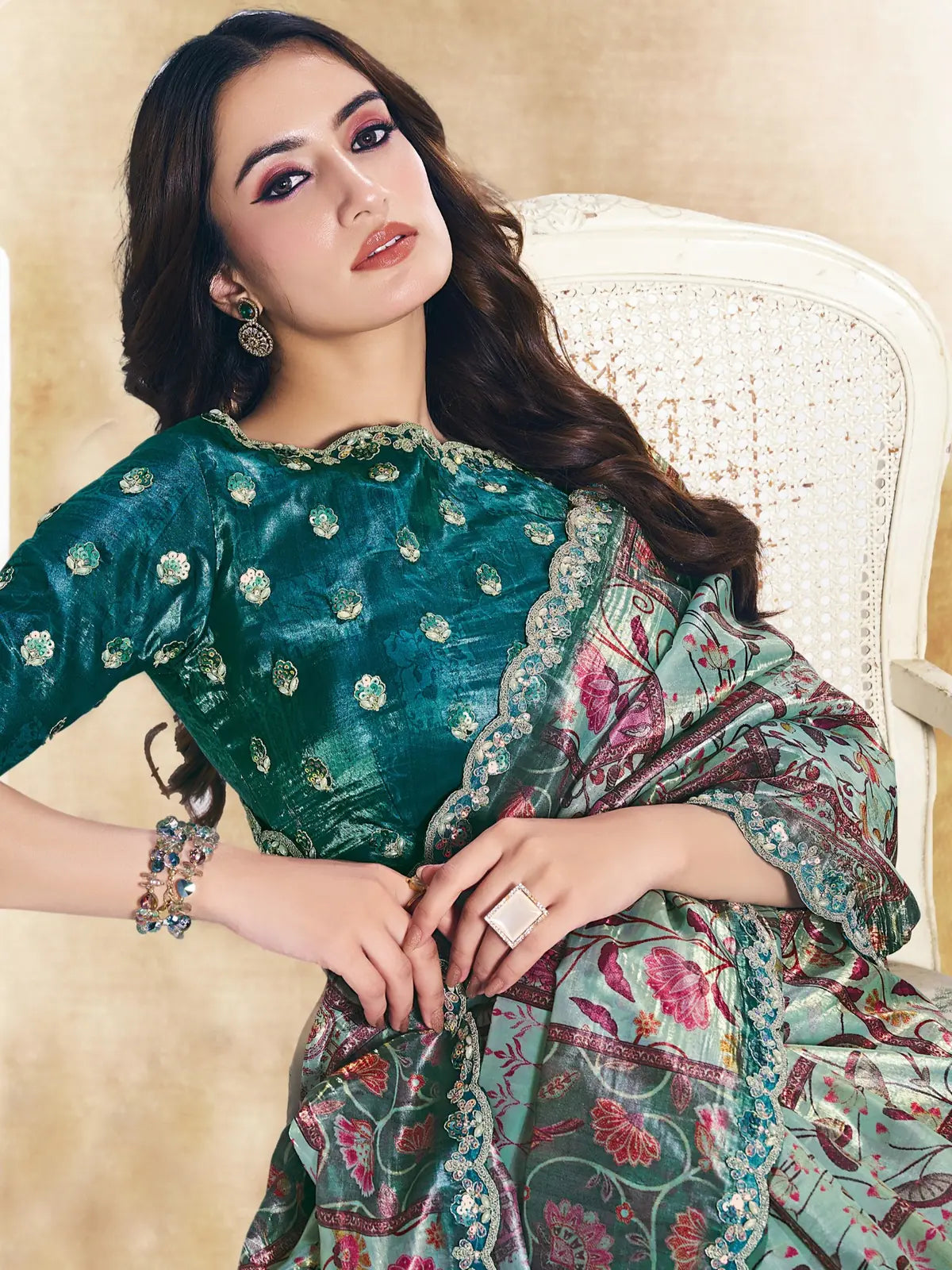 Tarani Charul teal Paper Silk saree upper body view showing blouse embroidery and stone detailing