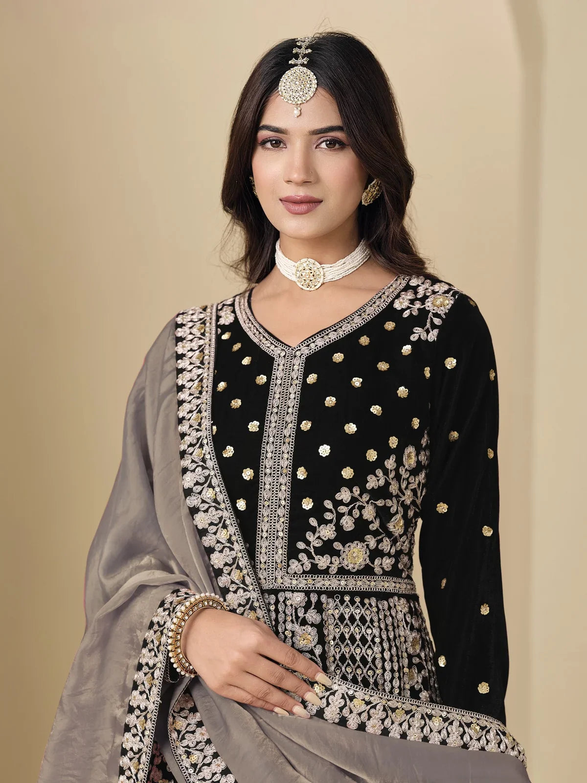 Tarani premium black velvet dress close-up showing embroidery and neckline details