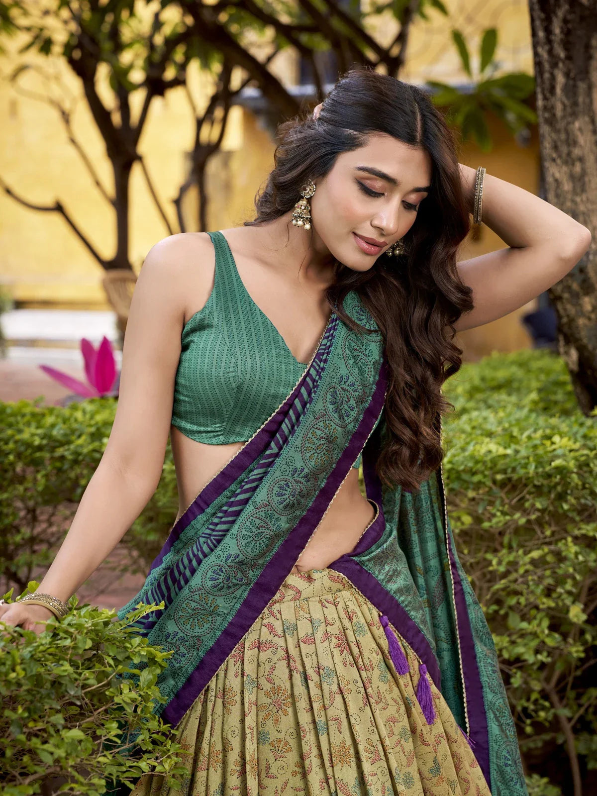 Tarani green Vichitra silk lehenga blouse close-up with festive dupatta and side drape view