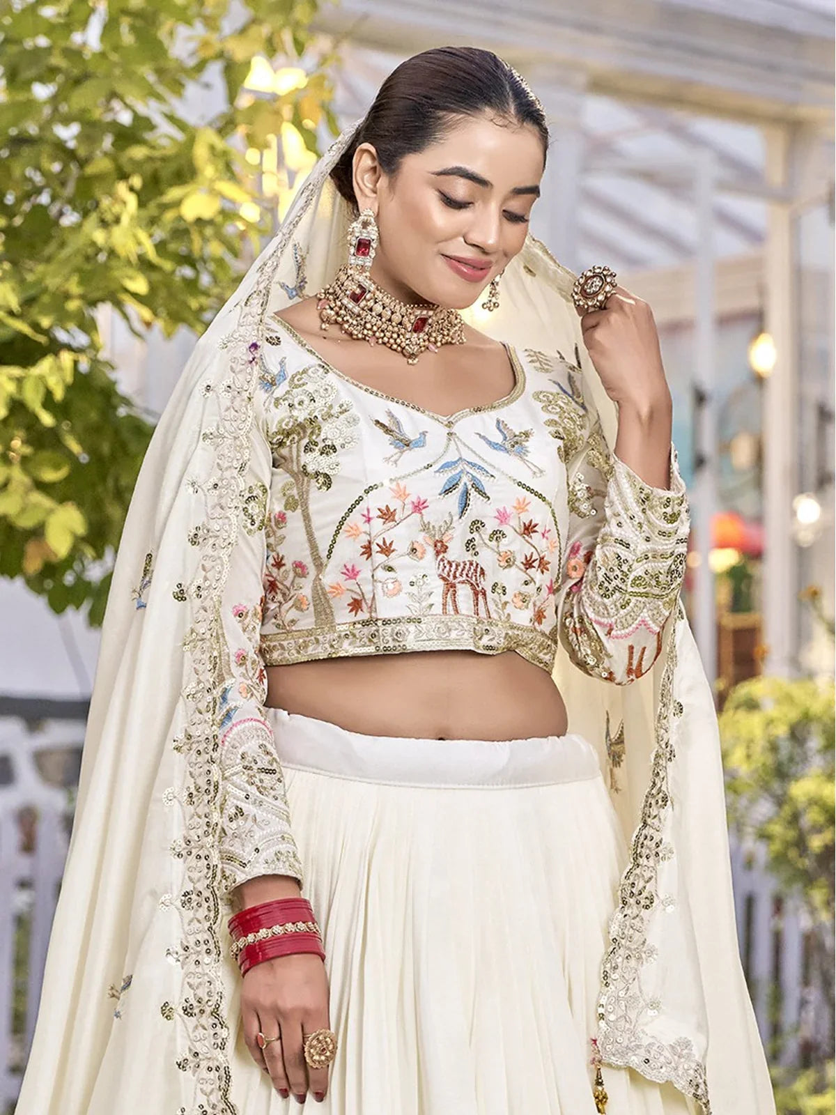 Tarani offwhite lehenga blouse closeup with floral thread and sequence embroidery on Vichitra fabric