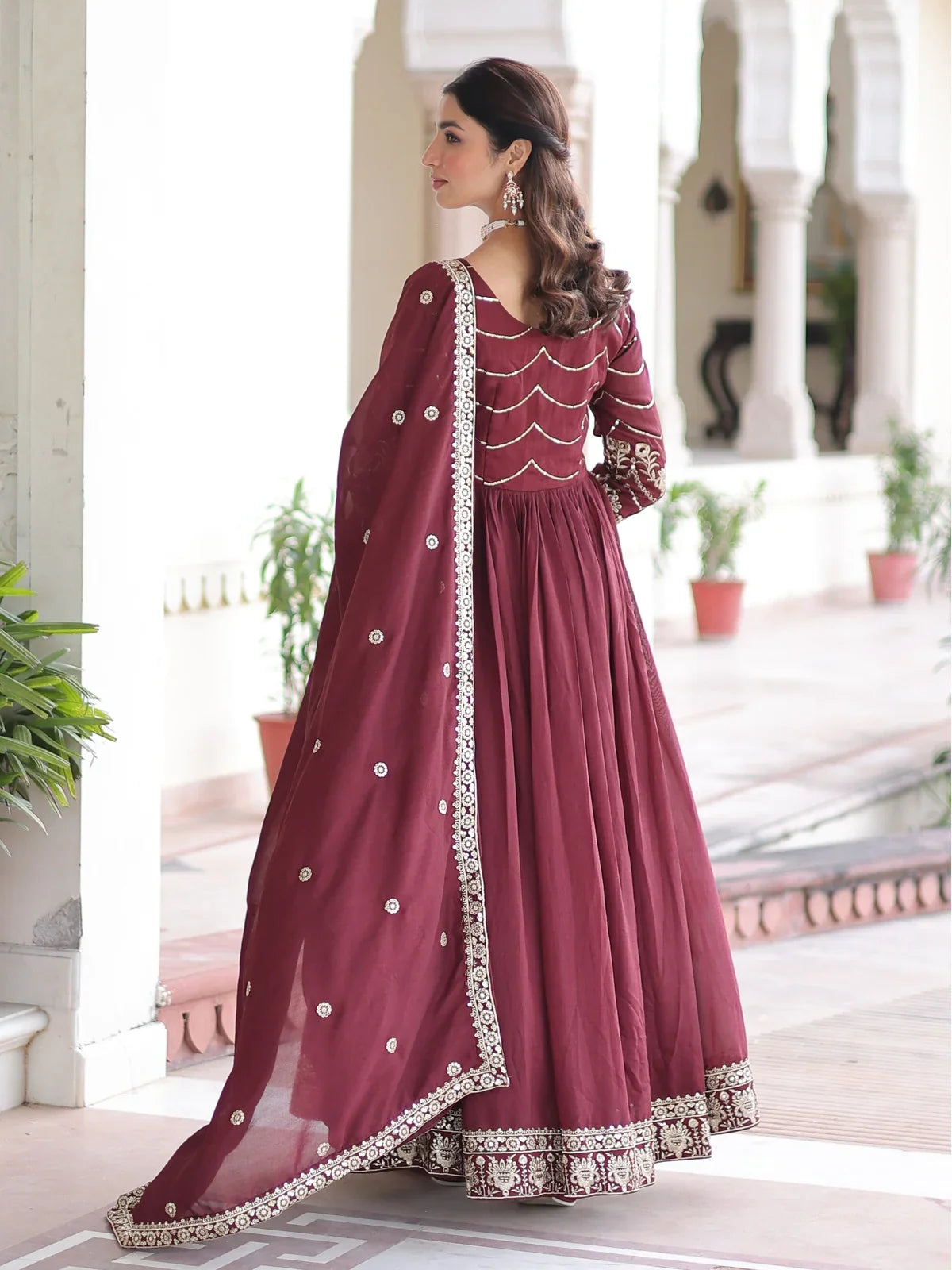 Tarani maroon Vichitra silk gown back view with dupatta drape and embroidered border