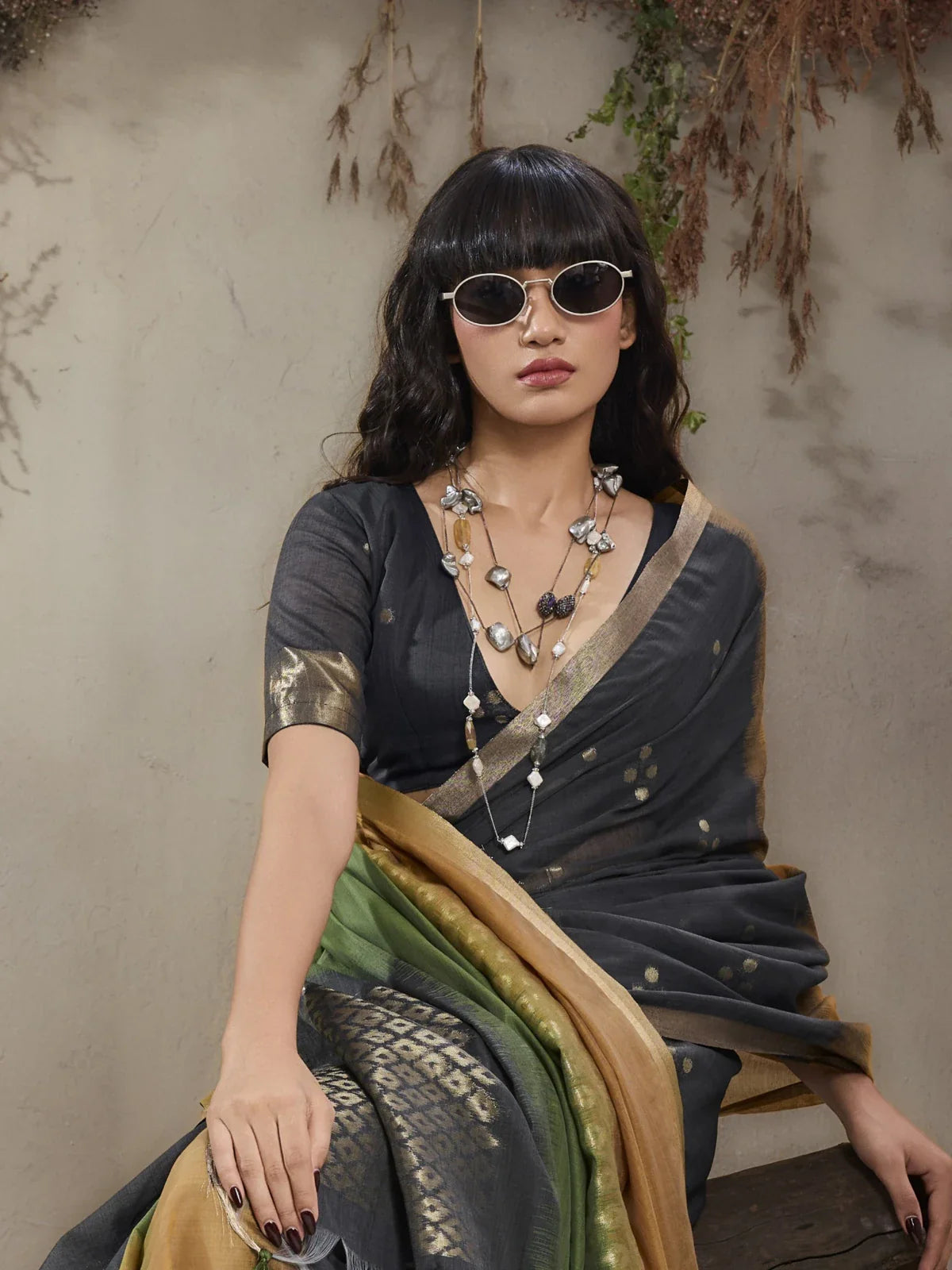 Tarani party wear viscose cotton saree upper body close-up with elegant golden blouse