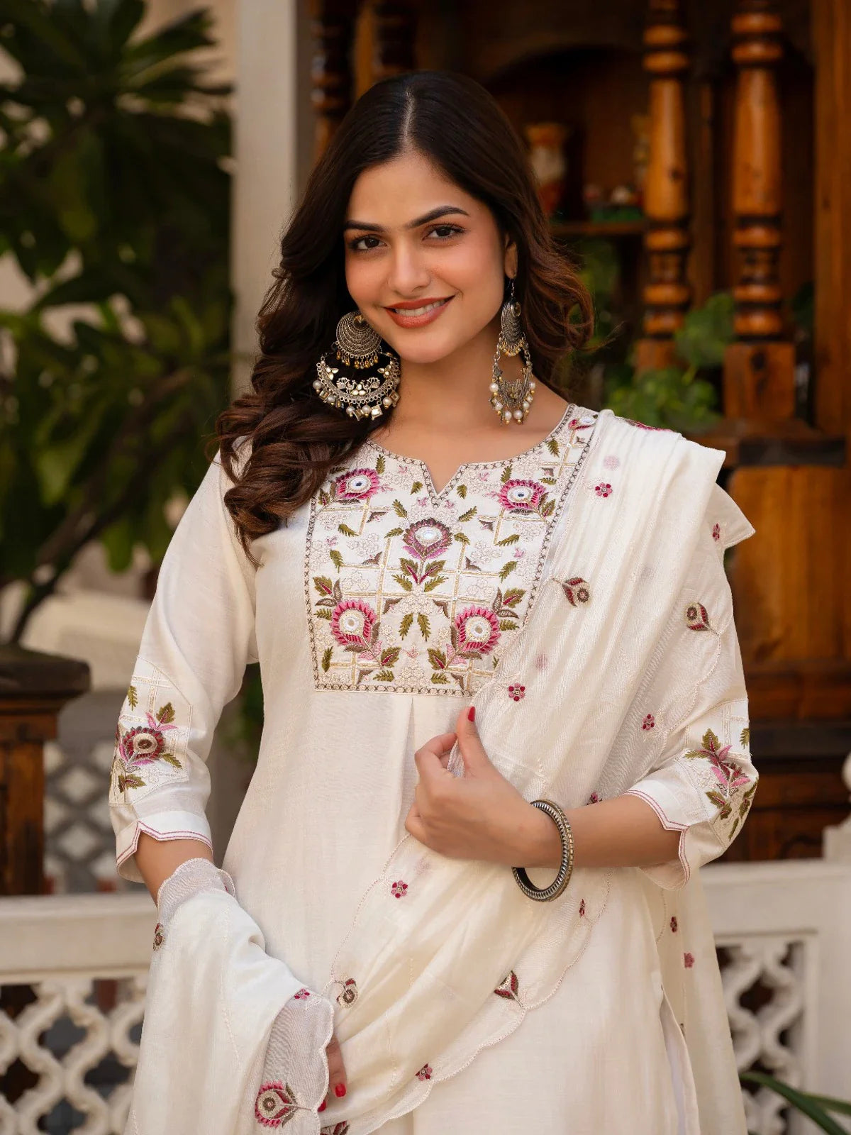 Tarani close-up white silk festive dress with floral embroidery and sequin handwork