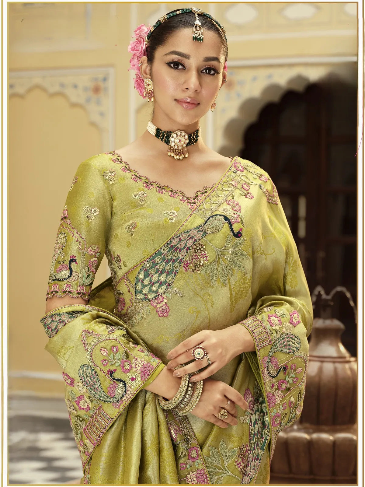 Tarani green viscose jacquard saree upper body view showing embroidered blouse and jewellery
