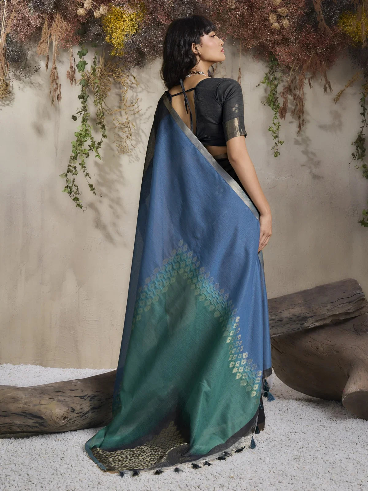 Tarani green viscose saree back view showing full pallu and elegant flow