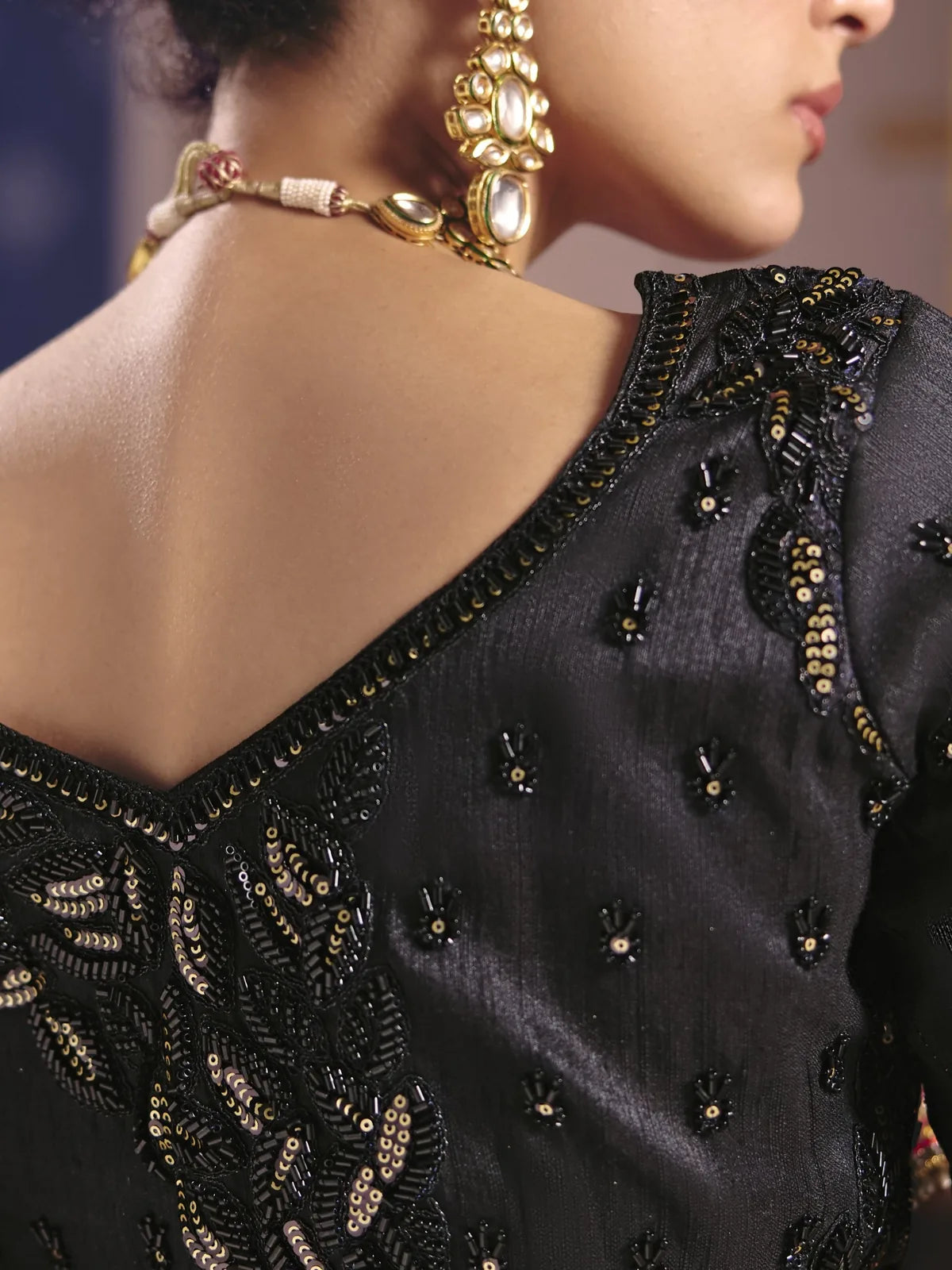 Tarani black blouse back view with heavy embroidery