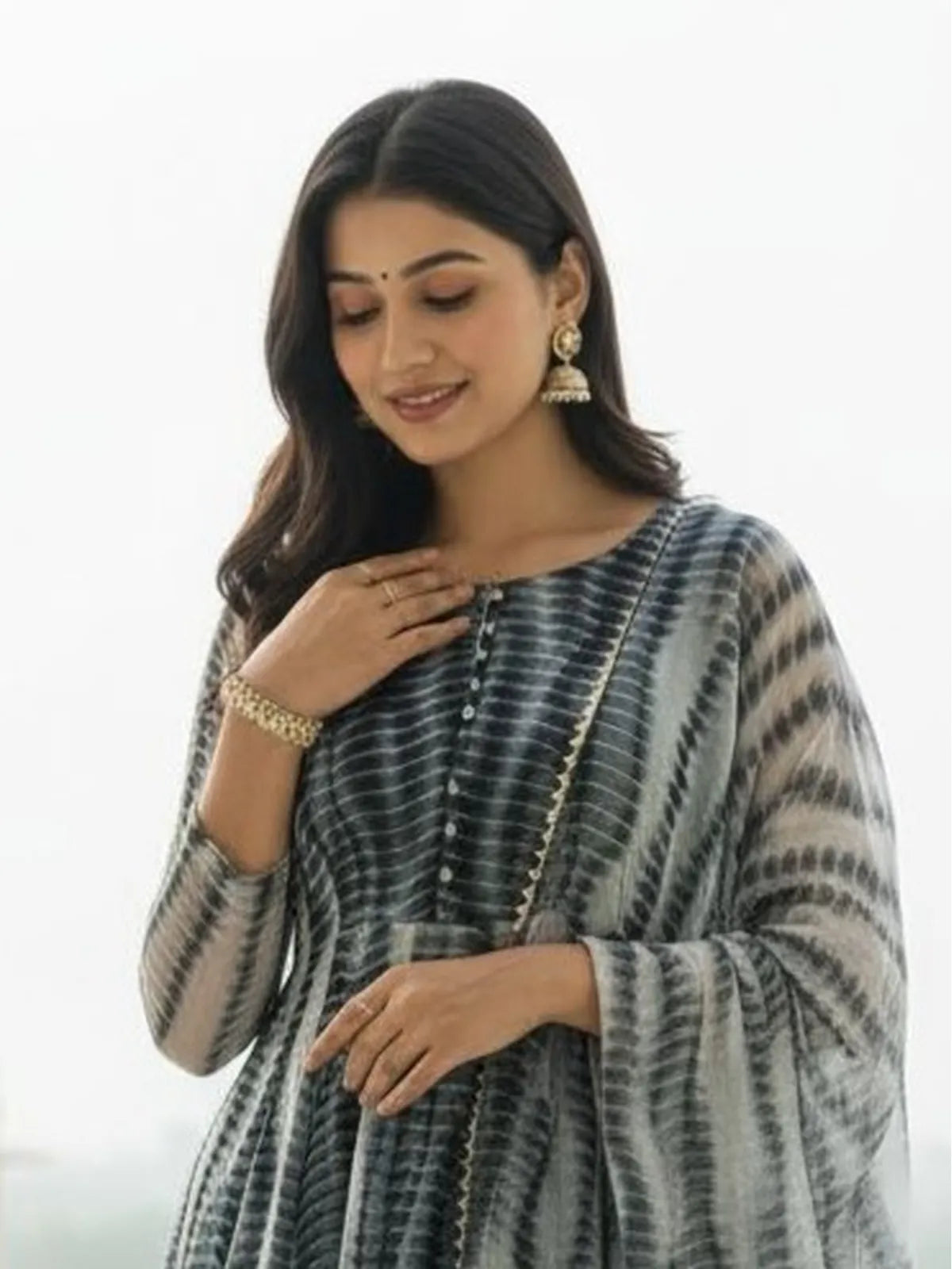 Tarani premium grey printed dress in weightless fabric with elegant neckline and full sleeves