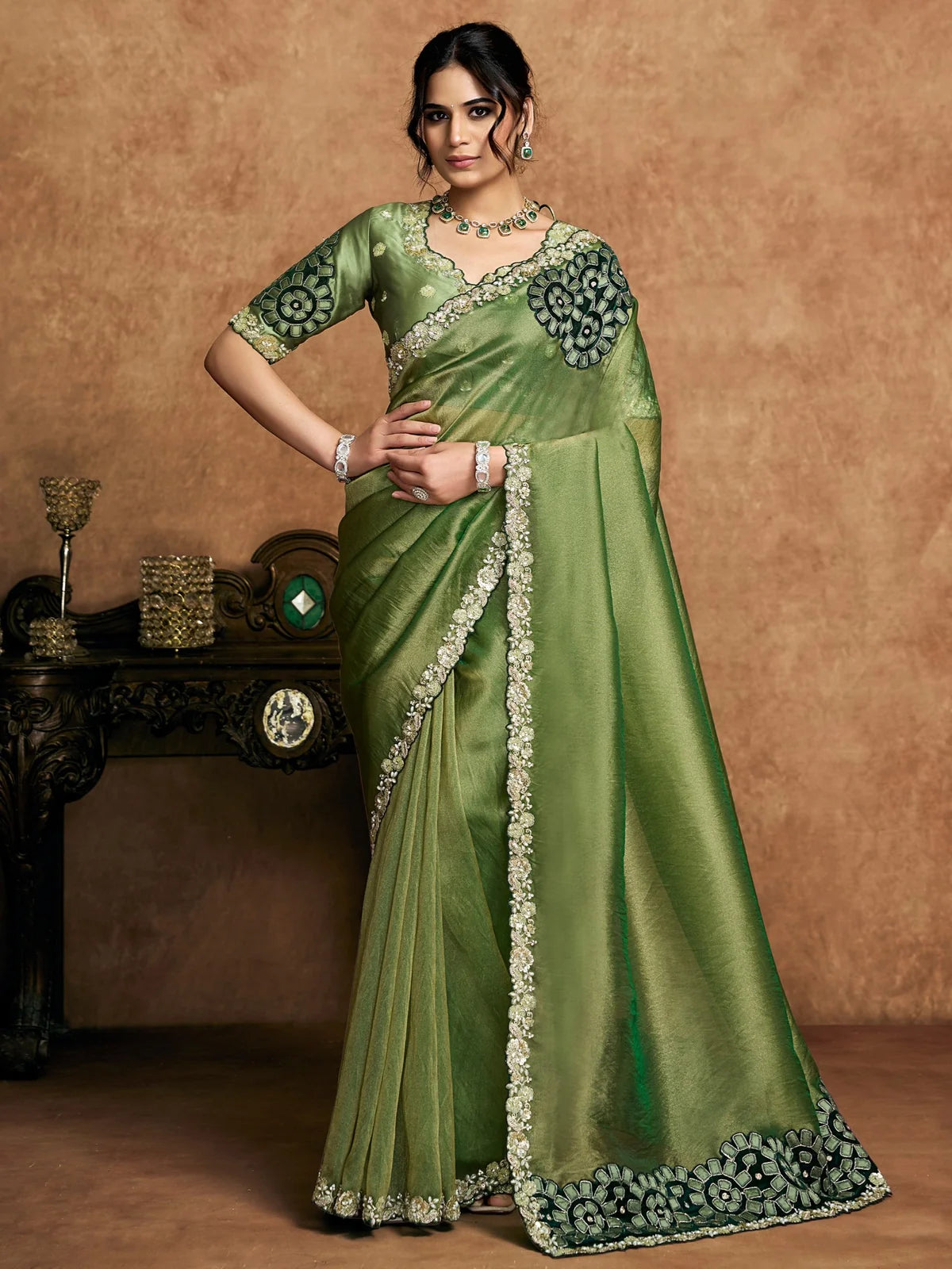 Tarani Rajashri green Zari Organza Satin saree full view with pearl stone sequin applique work and Raw Satin blouse