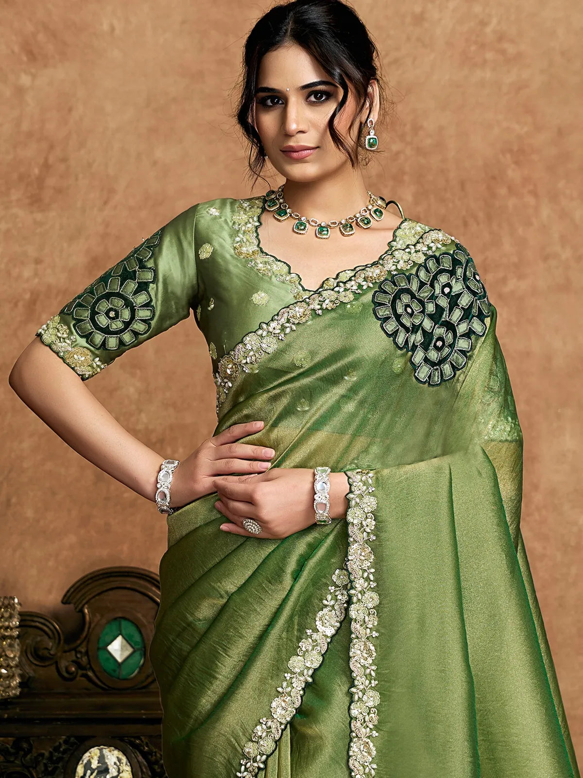 Tarani Rajashri green Zari Organza Satin saree upper body view with embellished blouse and floral applique work
