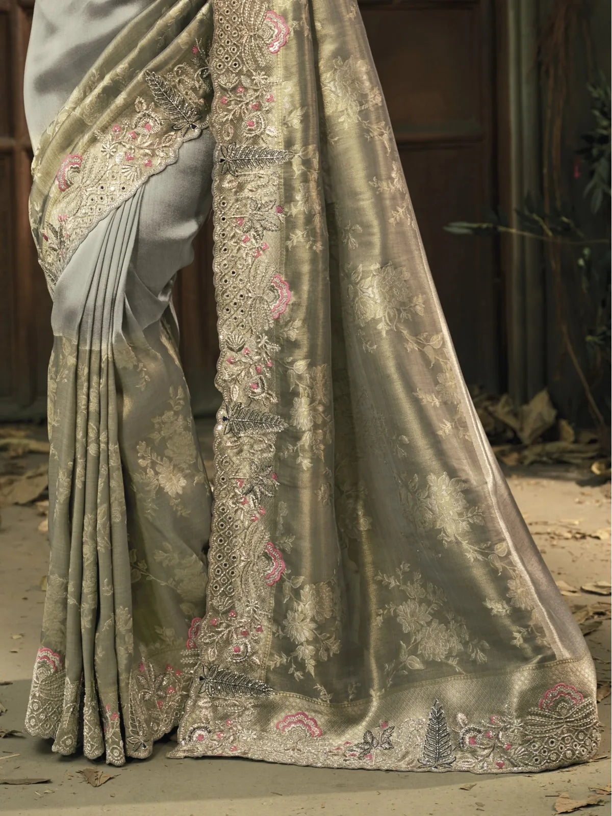 Tarani silver ziraf saree pallu closeup showing embroidery and shimmer effect