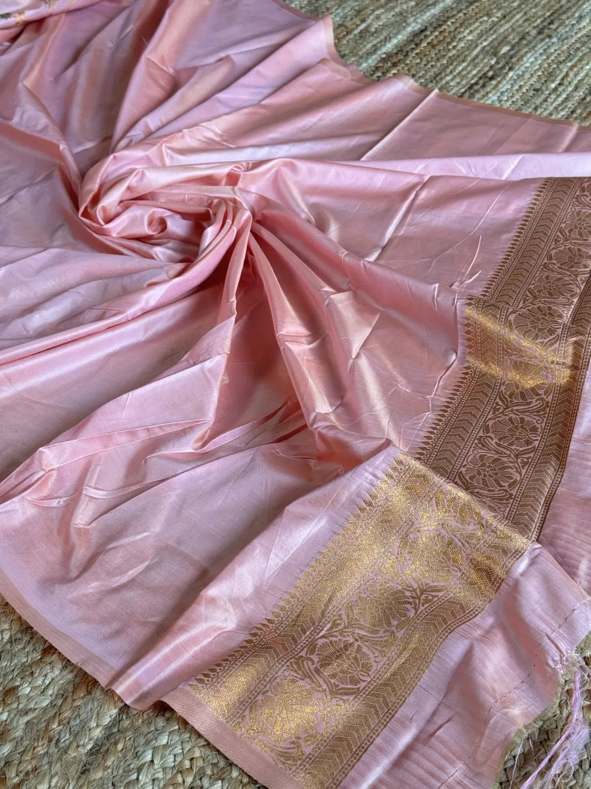 Tarani pink silk saree fabric closeup golden zari border design