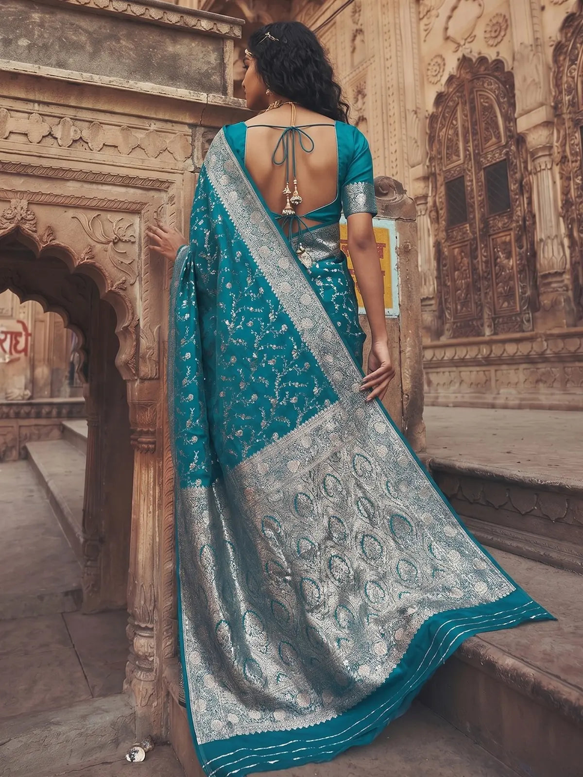 Tarani Ekveera teal art silk saree back view with blouse design and woven pallu