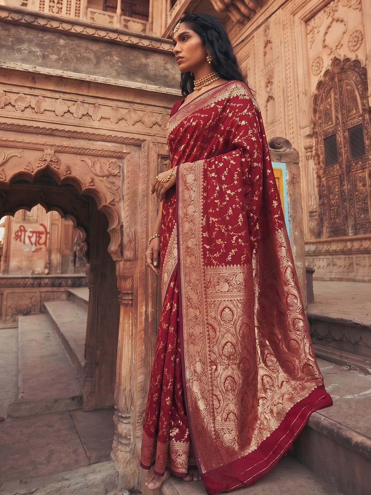 Tarani Joshika premium maroon zari woven art silk saree side view showcasing elegant pallu and border