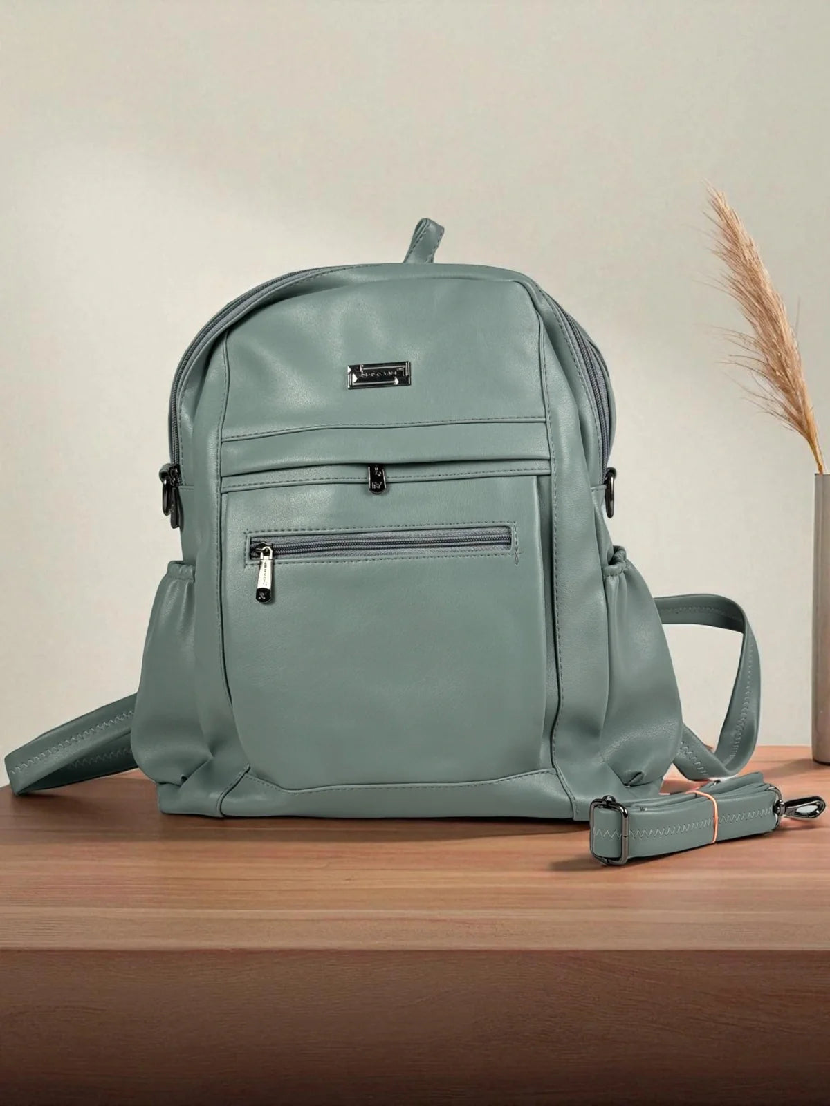 Tarani green PU leather backpack with multiple compartments for office and casual use