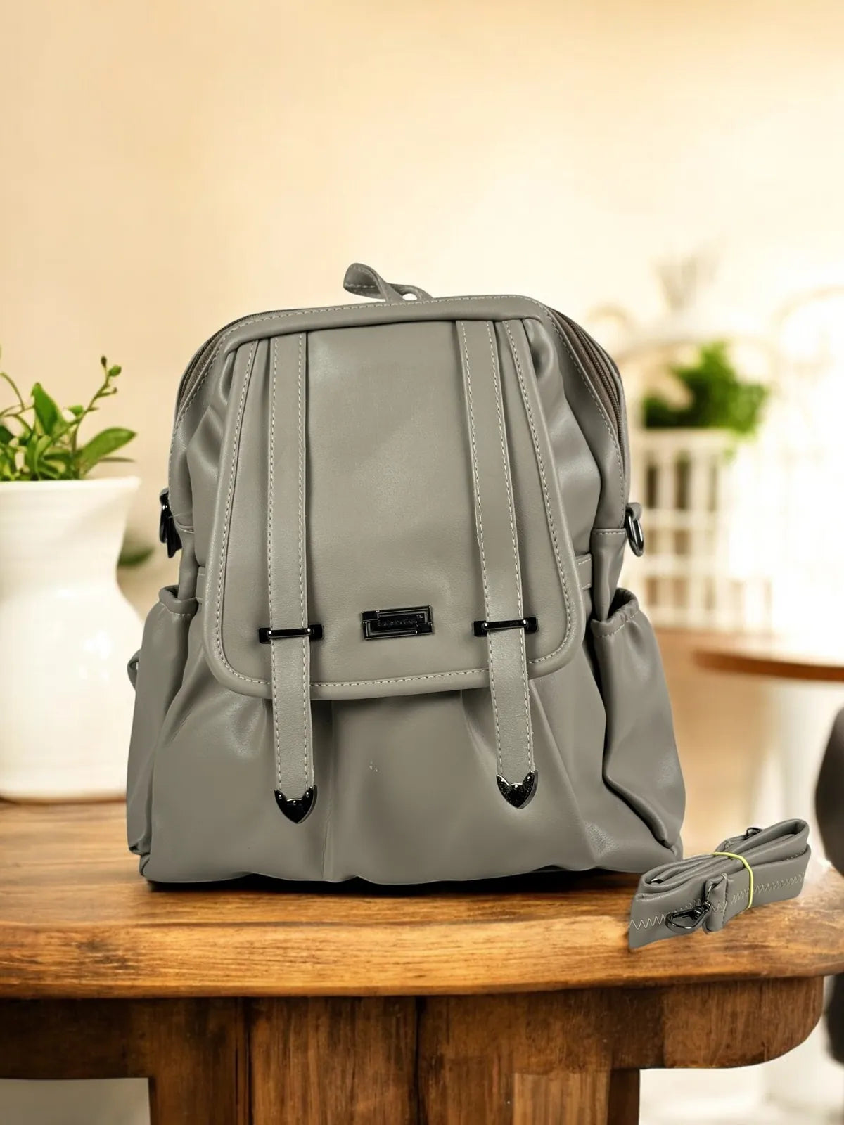 Tarani grey PU leather backpack front view for office and casual use