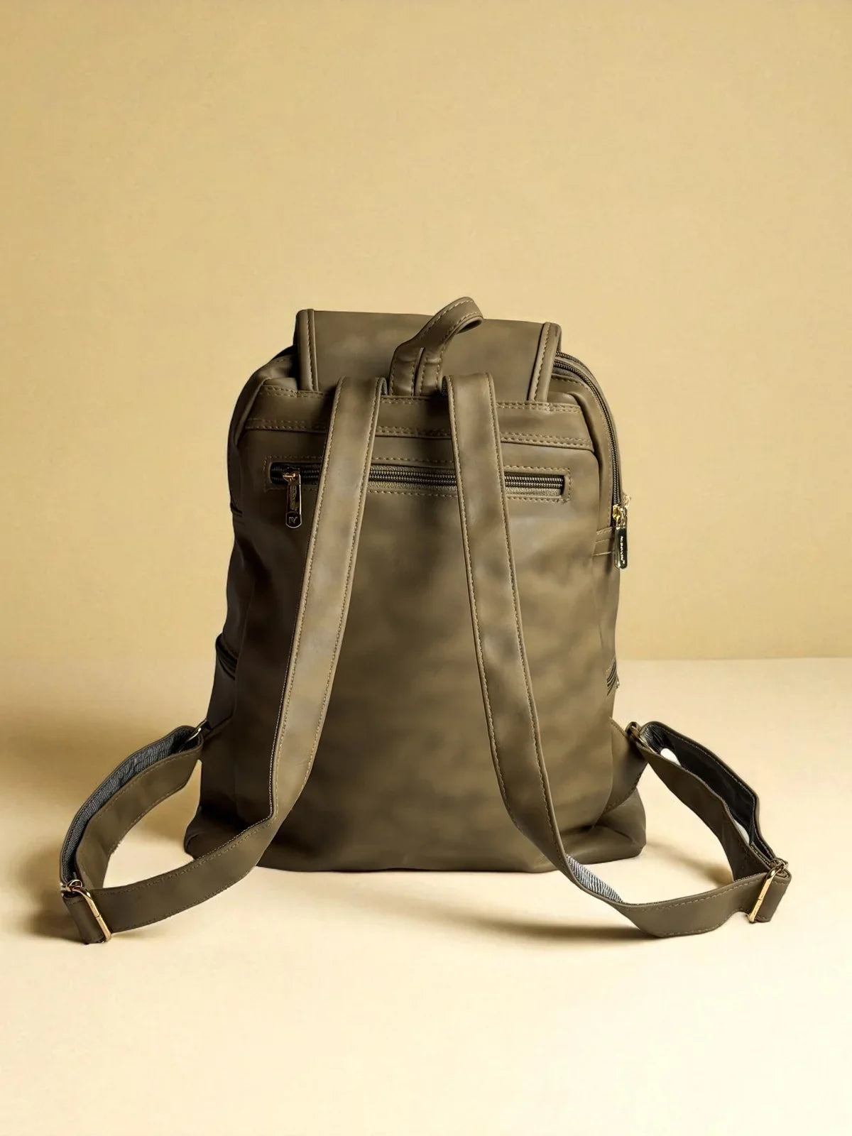 Tarani olive PU leather backpack back view with straps