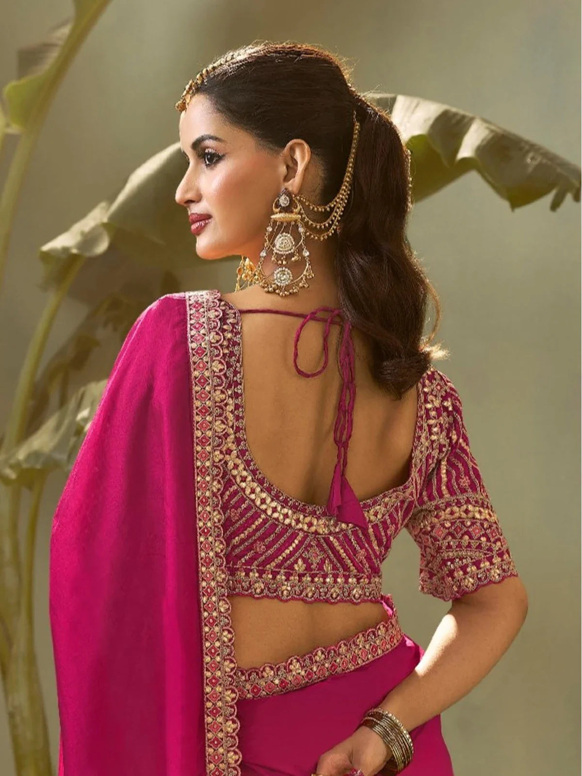 Tarani pink bamber silk saree back view with intricate embroidery blouse pattern